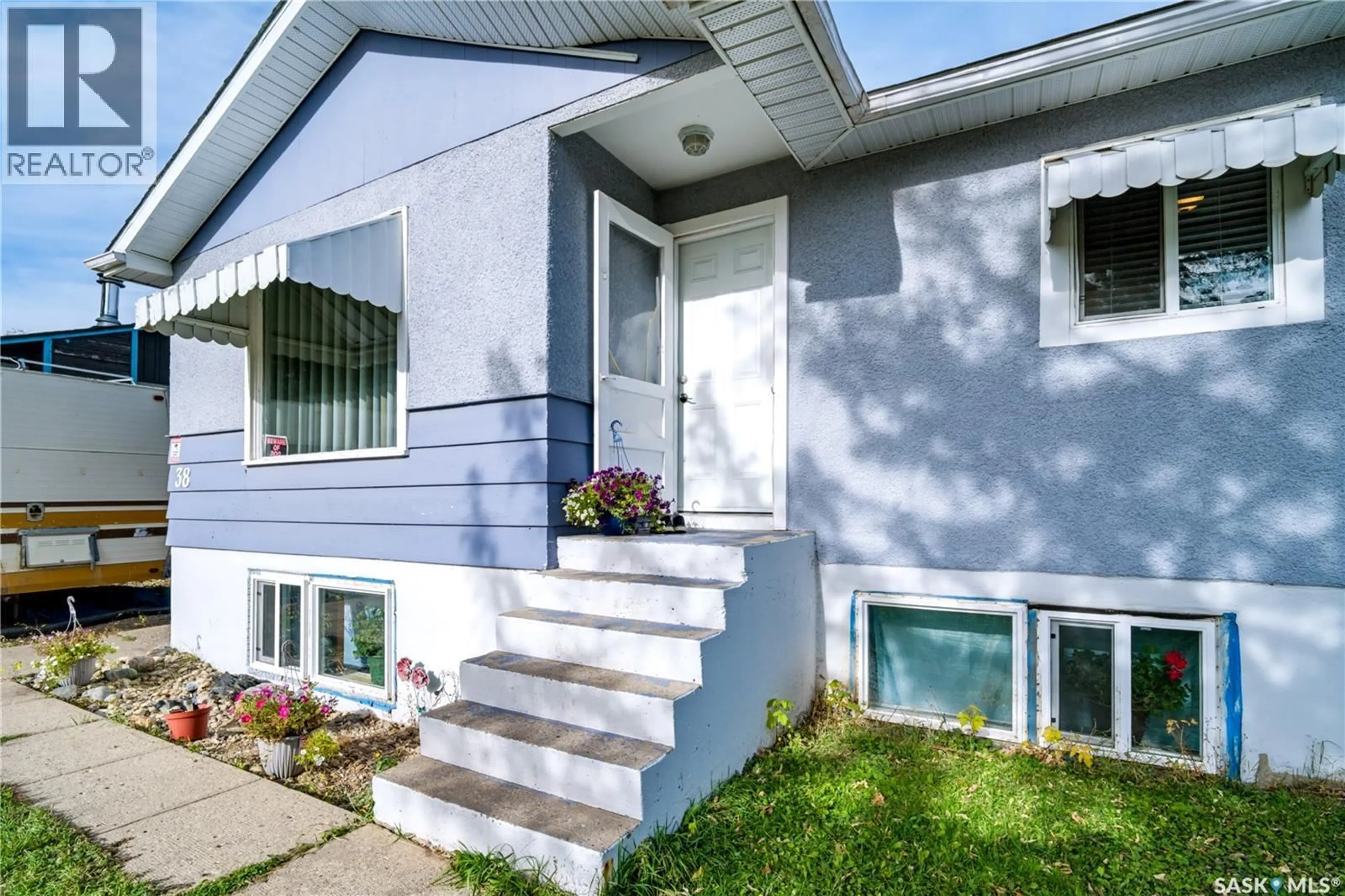 Home with vinyl exterior material, street for 38 30TH STREET, Prince Albert Saskatchewan S6V1Y9