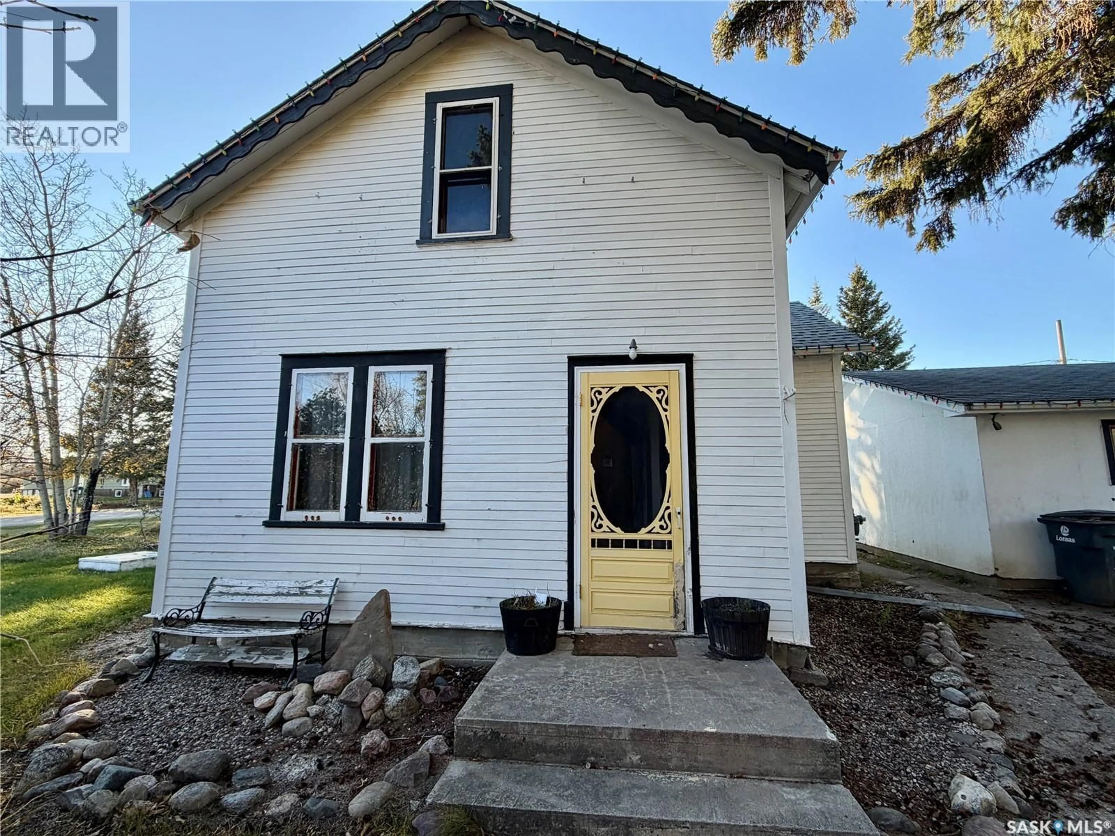Home with vinyl exterior material, street for 302 3RD STREET, Medstead Saskatchewan S0M1W0