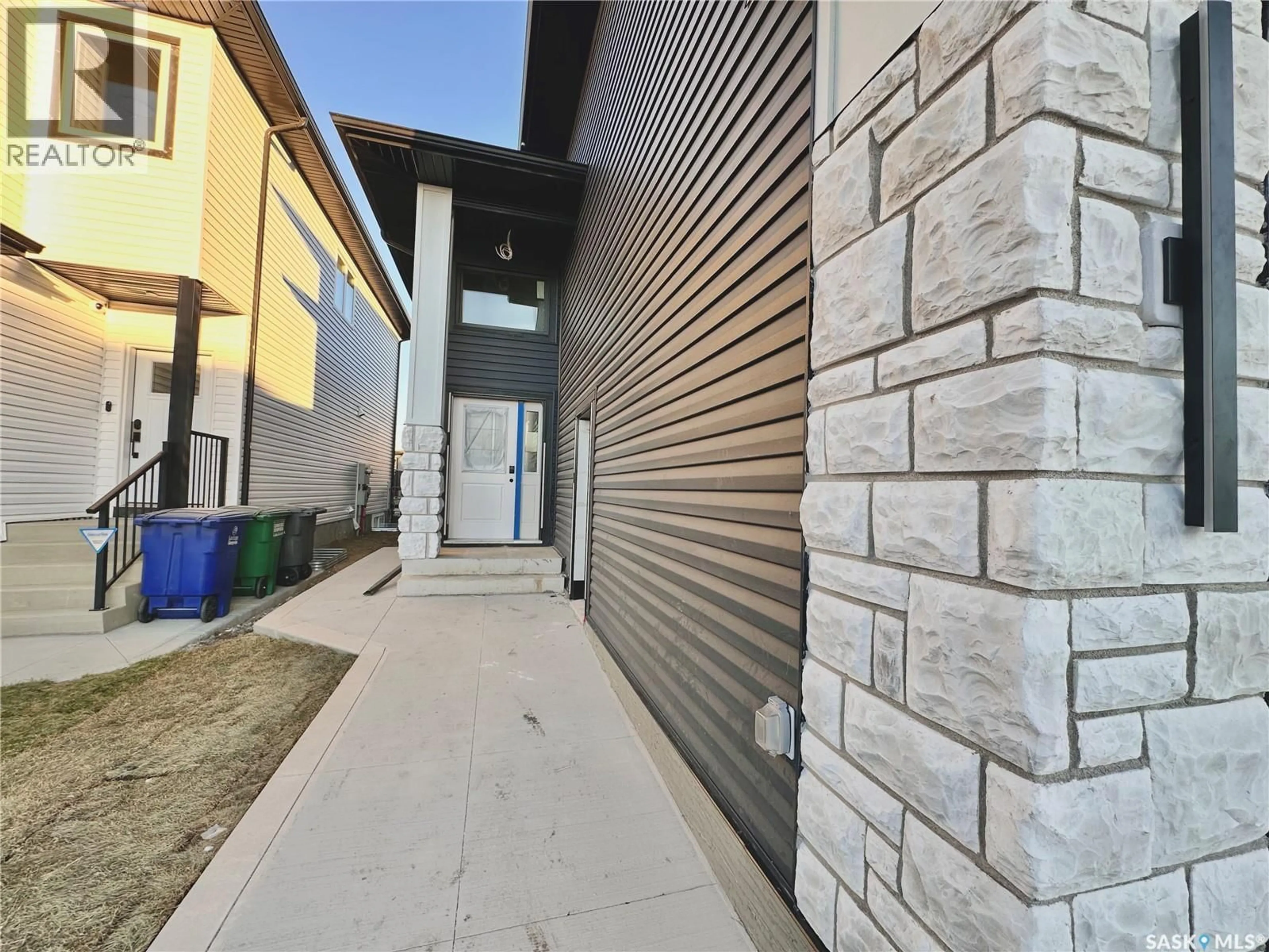 Home with brick exterior material, street for 843 NIGHTINGALE ROAD, Saskatoon Saskatchewan S7L7R4