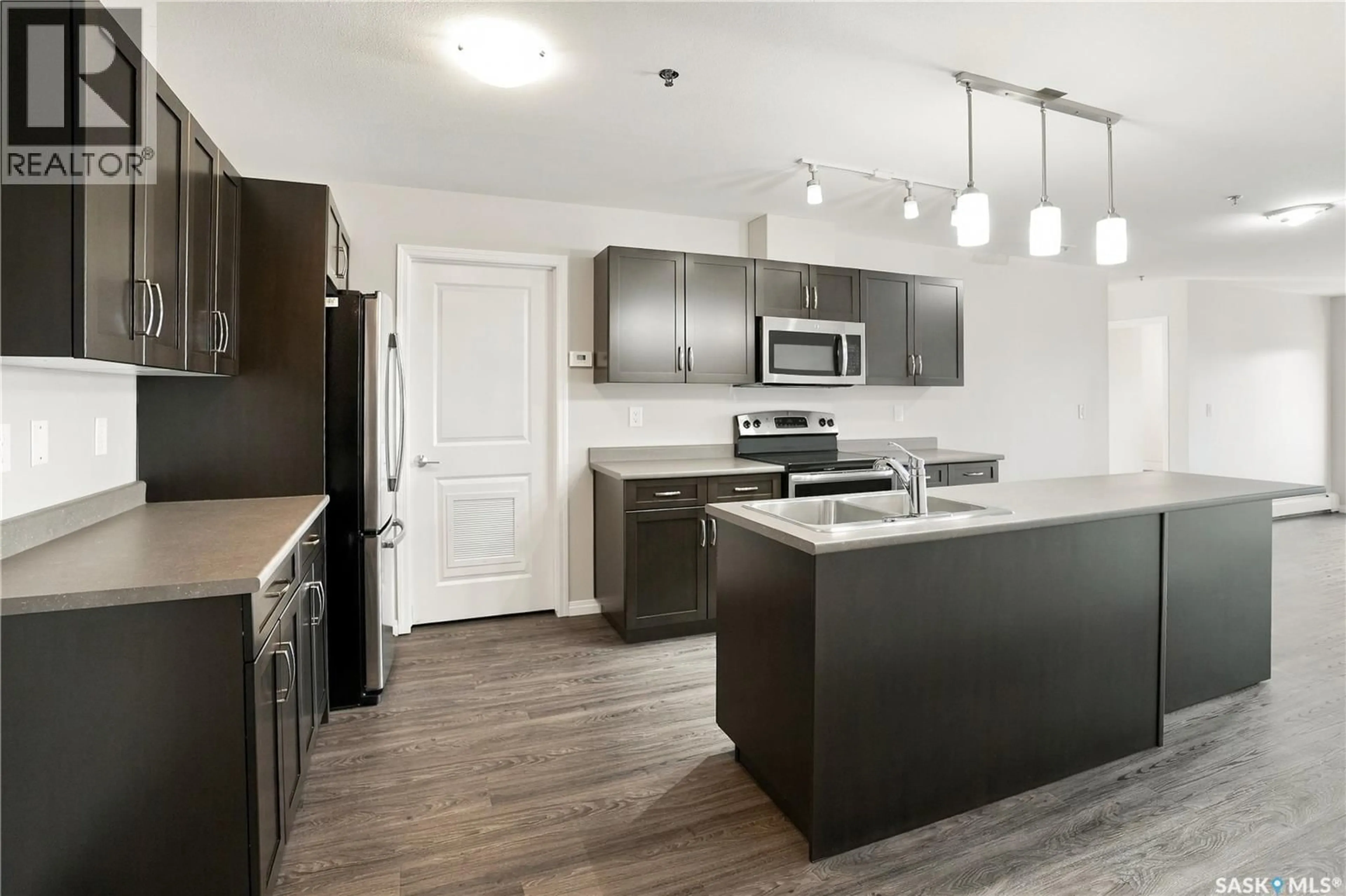 Open concept kitchen, unknown for 307 - 2452 KILLDEER DRIVE, North Battleford Saskatchewan S9A3T5
