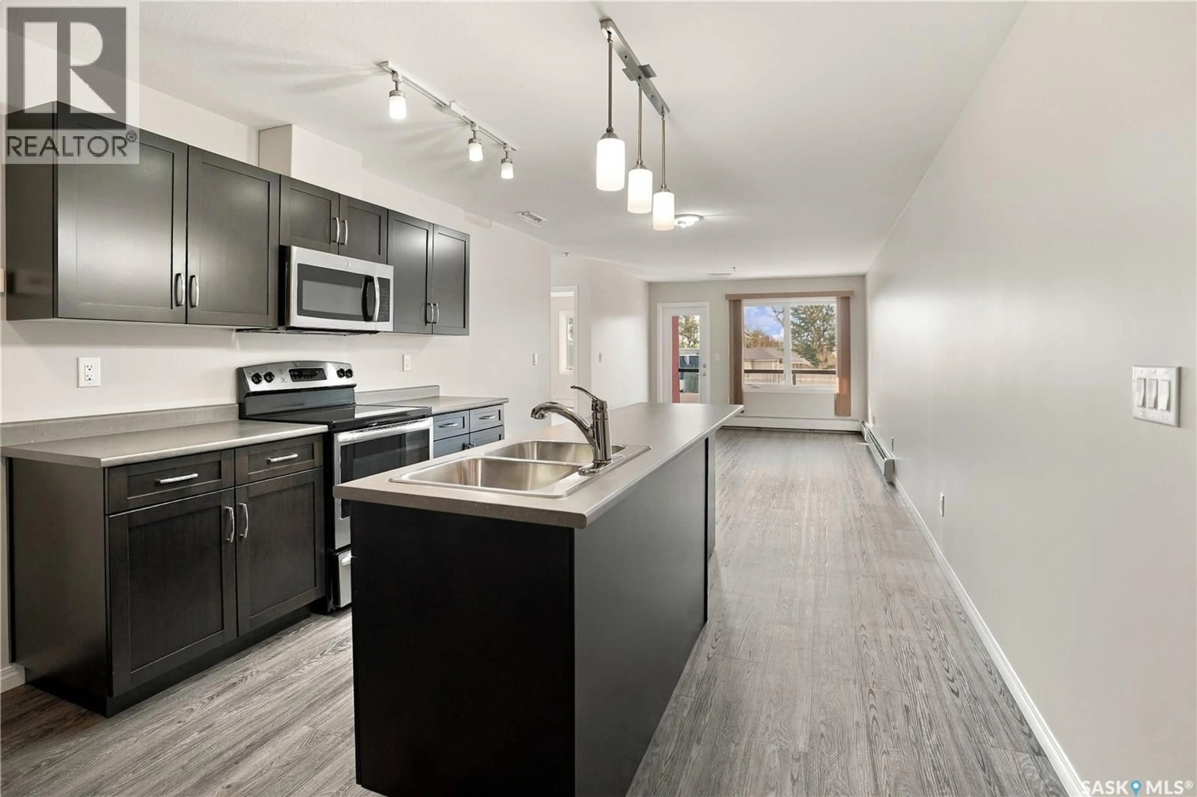 Open concept kitchen, unknown for 307 - 2452 KILLDEER DRIVE, North Battleford Saskatchewan S9A3T5
