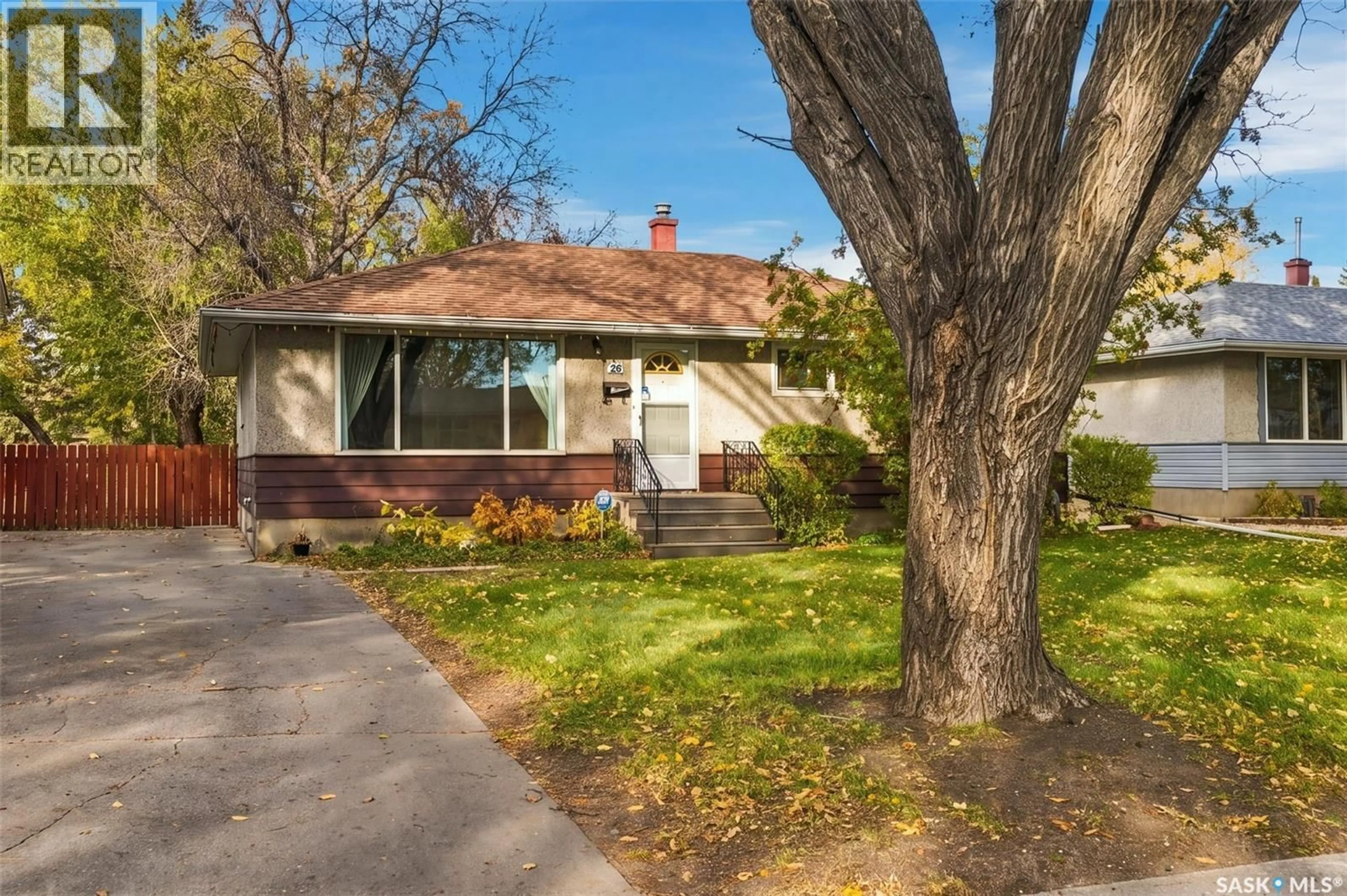 Home with vinyl exterior material, street for 20 YARNTON CRESCENT, Regina Saskatchewan S4R4A2