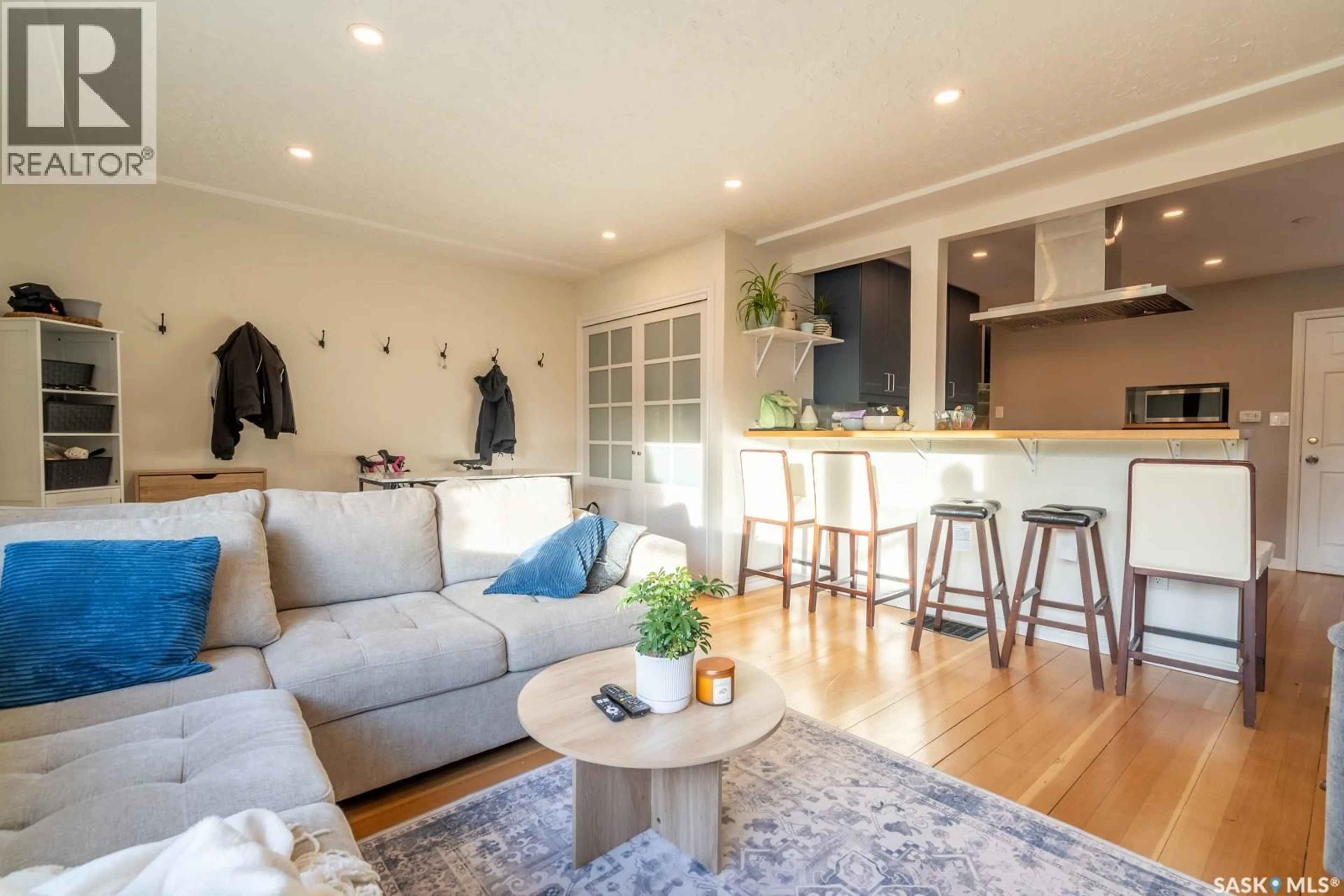 Open concept kitchen, wood/laminate floor for 2819 MCDONALD STREET, Regina Saskatchewan S4N3A1