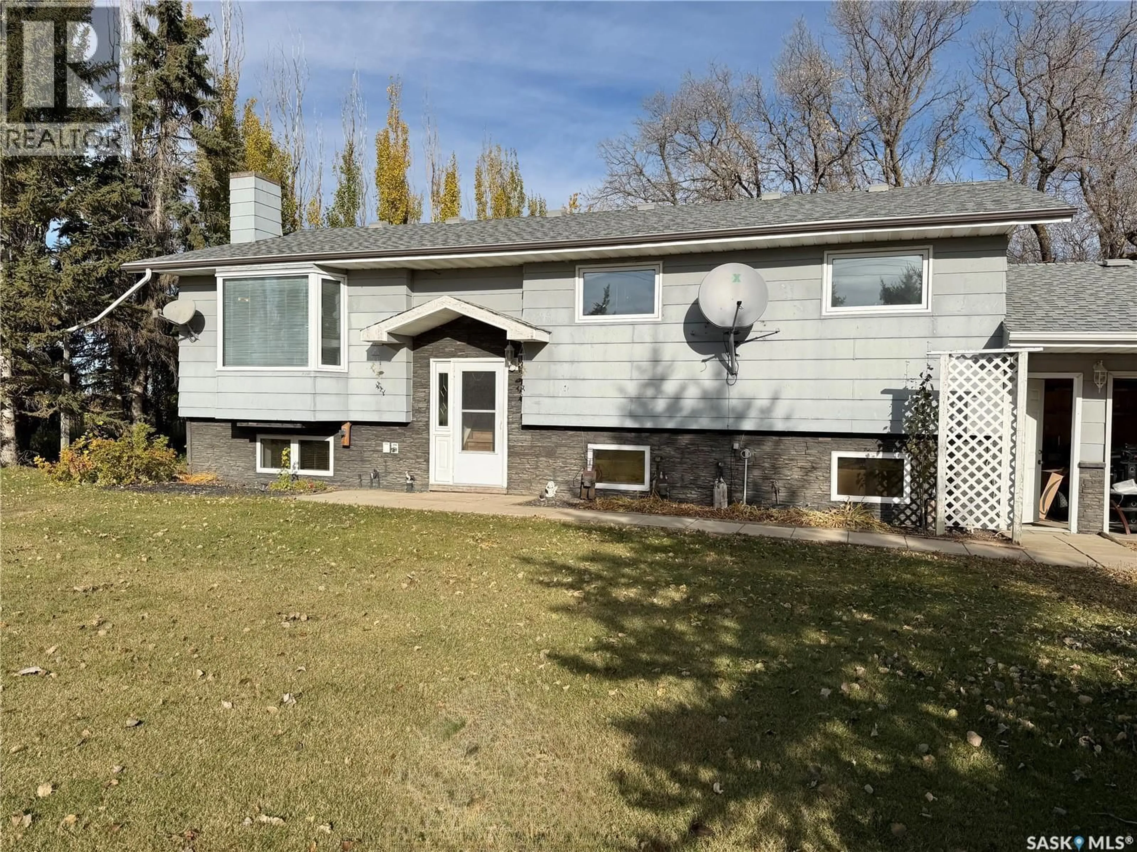 Home with vinyl exterior material, street for CALLFAS ACREAGE, Rosthern Rm No. 403 Saskatchewan S0K3R0