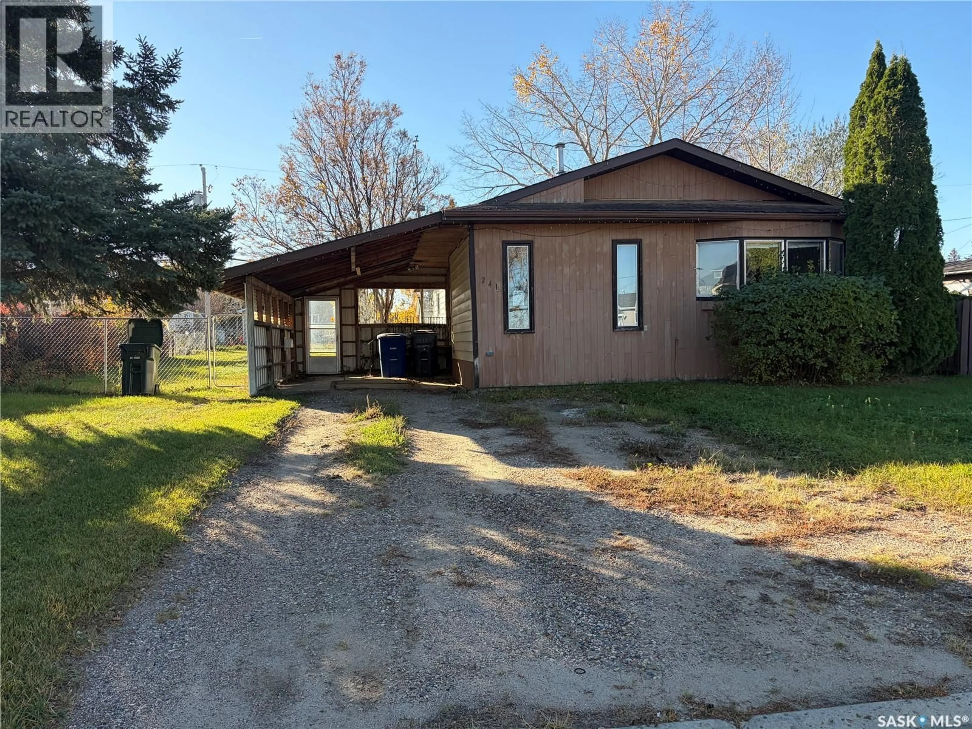 A pic from outside/outdoor area/front of a property/back of a property/a pic from drone, street for 241 30TH STREET, Battleford Saskatchewan S0M0E0