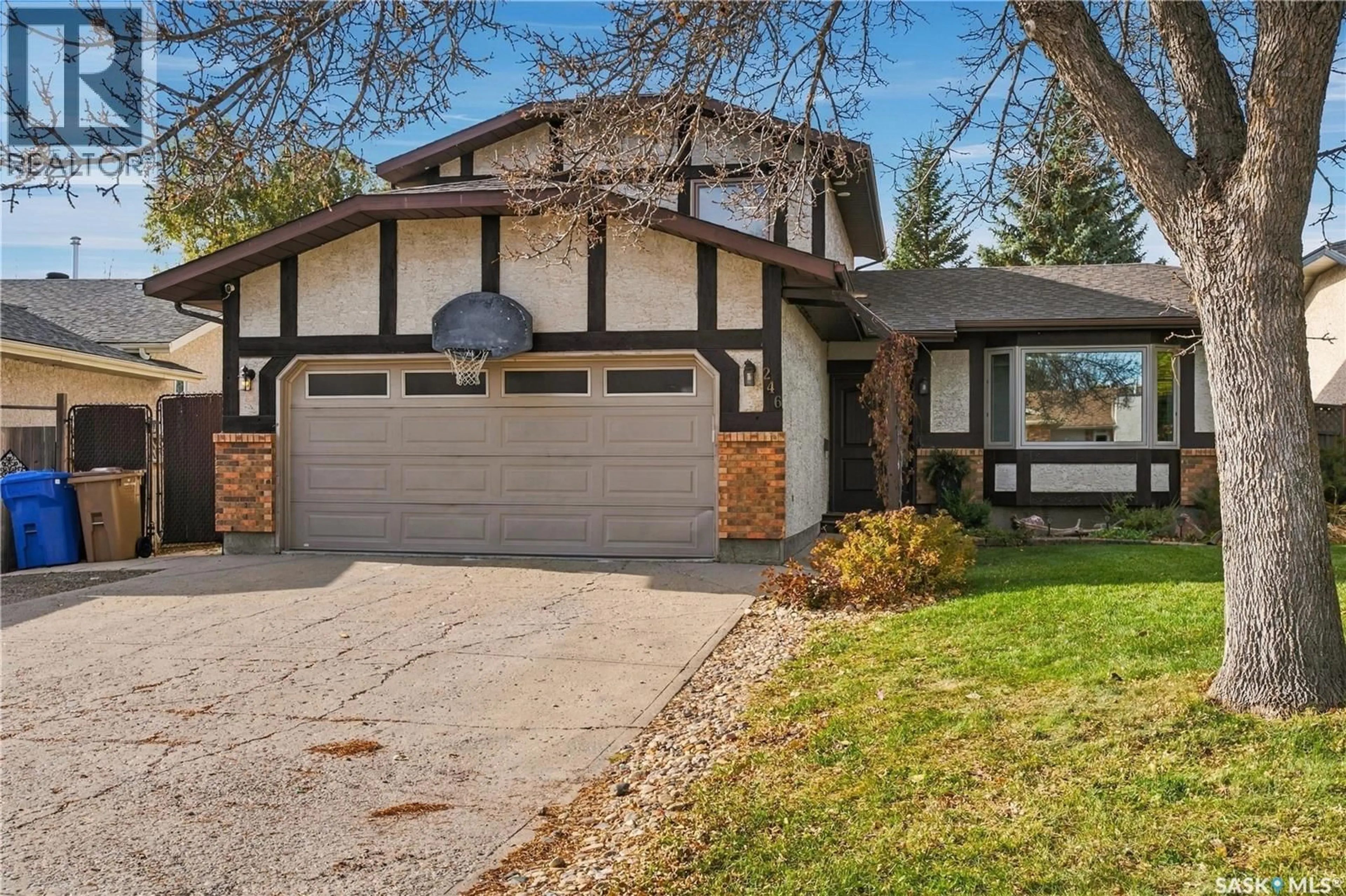 Home with vinyl exterior material, street for 246 HECTOR CRESCENT, Regina Saskatchewan S4Y1C3
