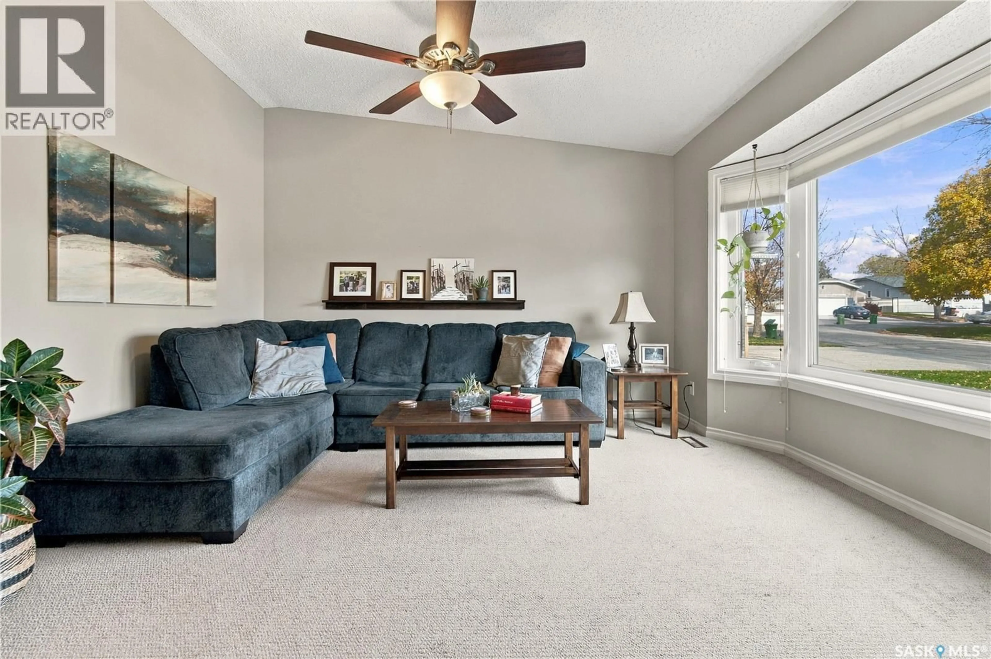 Living room with furniture, carpet floor for 246 HECTOR CRESCENT, Regina Saskatchewan S4Y1C3