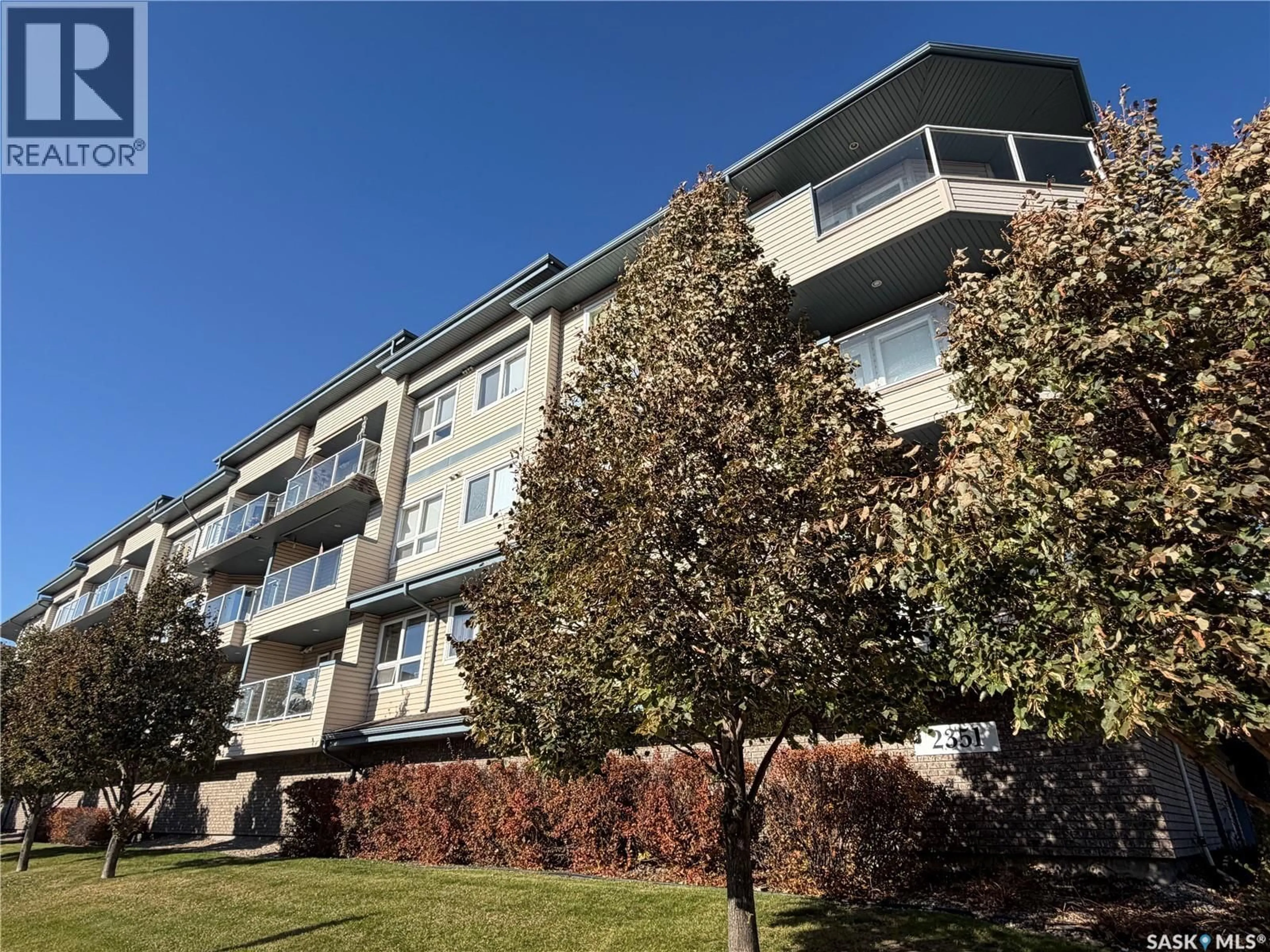 A pic from outside/outdoor area/front of a property/back of a property/a pic from drone, building for 2351 - 113 WINDSOR PARK ROAD, Regina Saskatchewan S4V1N4