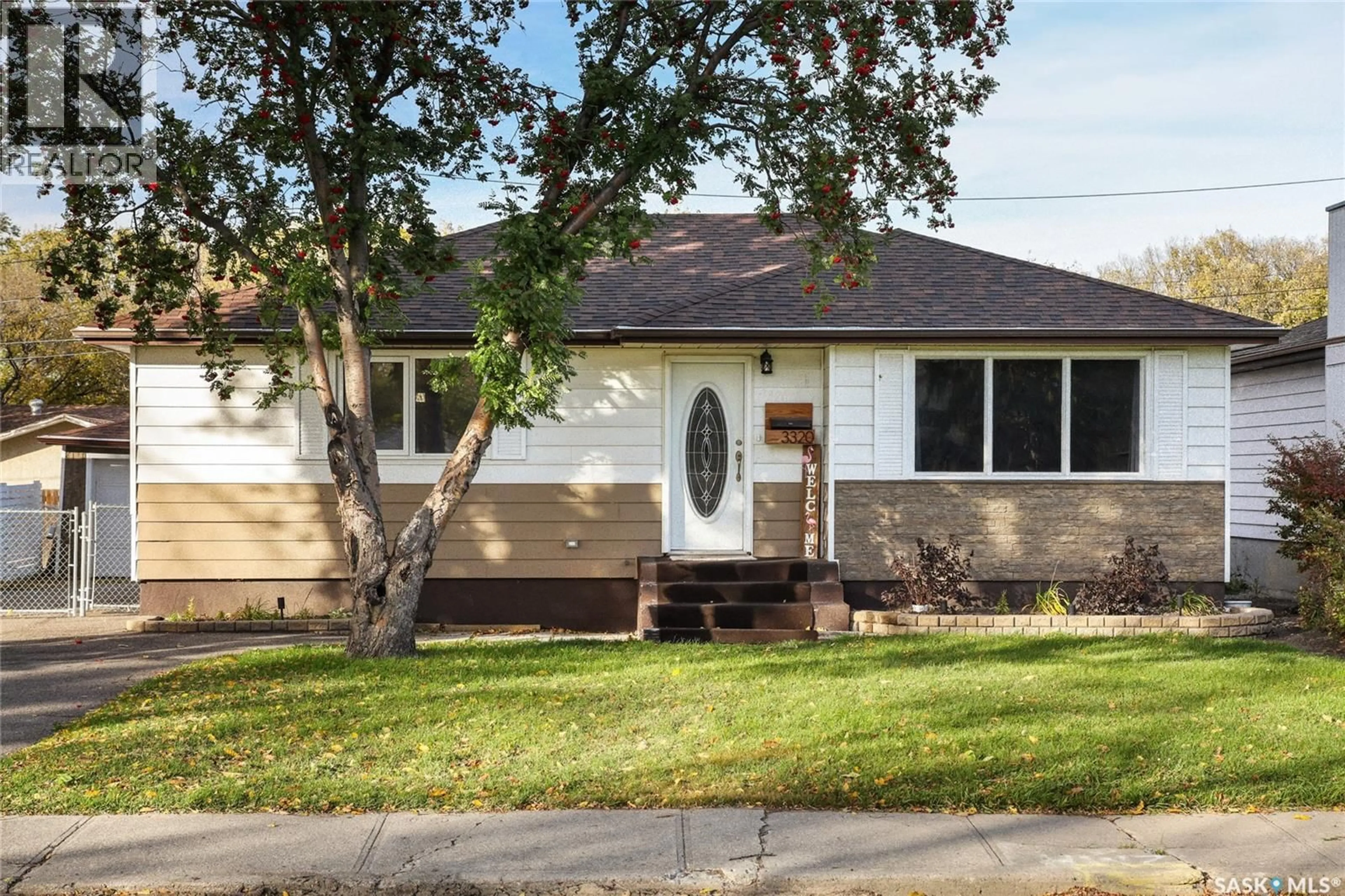 Home with vinyl exterior material, street for 3320 PERRY AVENUE, Regina Saskatchewan S4R3H8