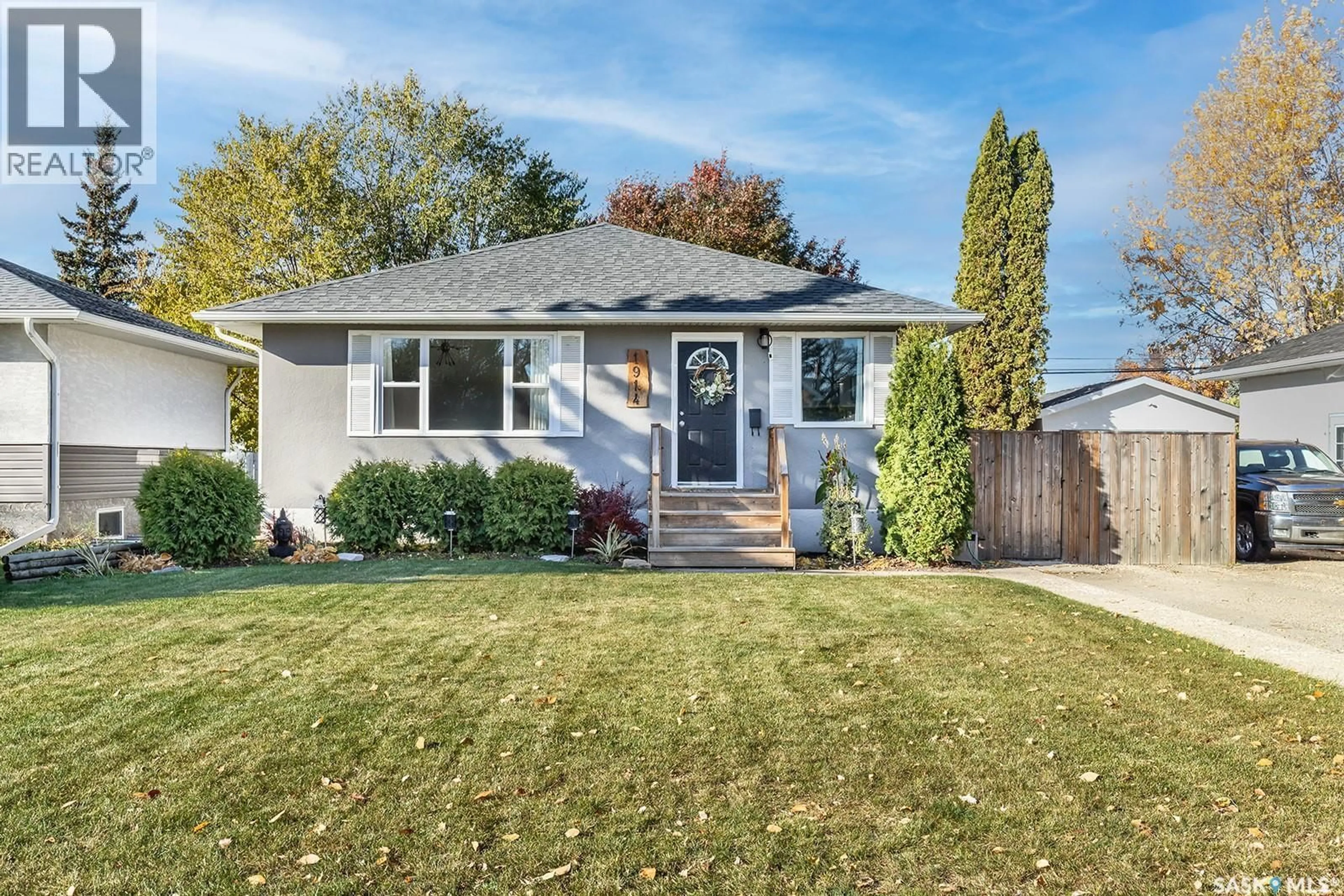 Home with vinyl exterior material, street for 1914 LANSDOWNE AVENUE, Saskatoon Saskatchewan S7J1G3