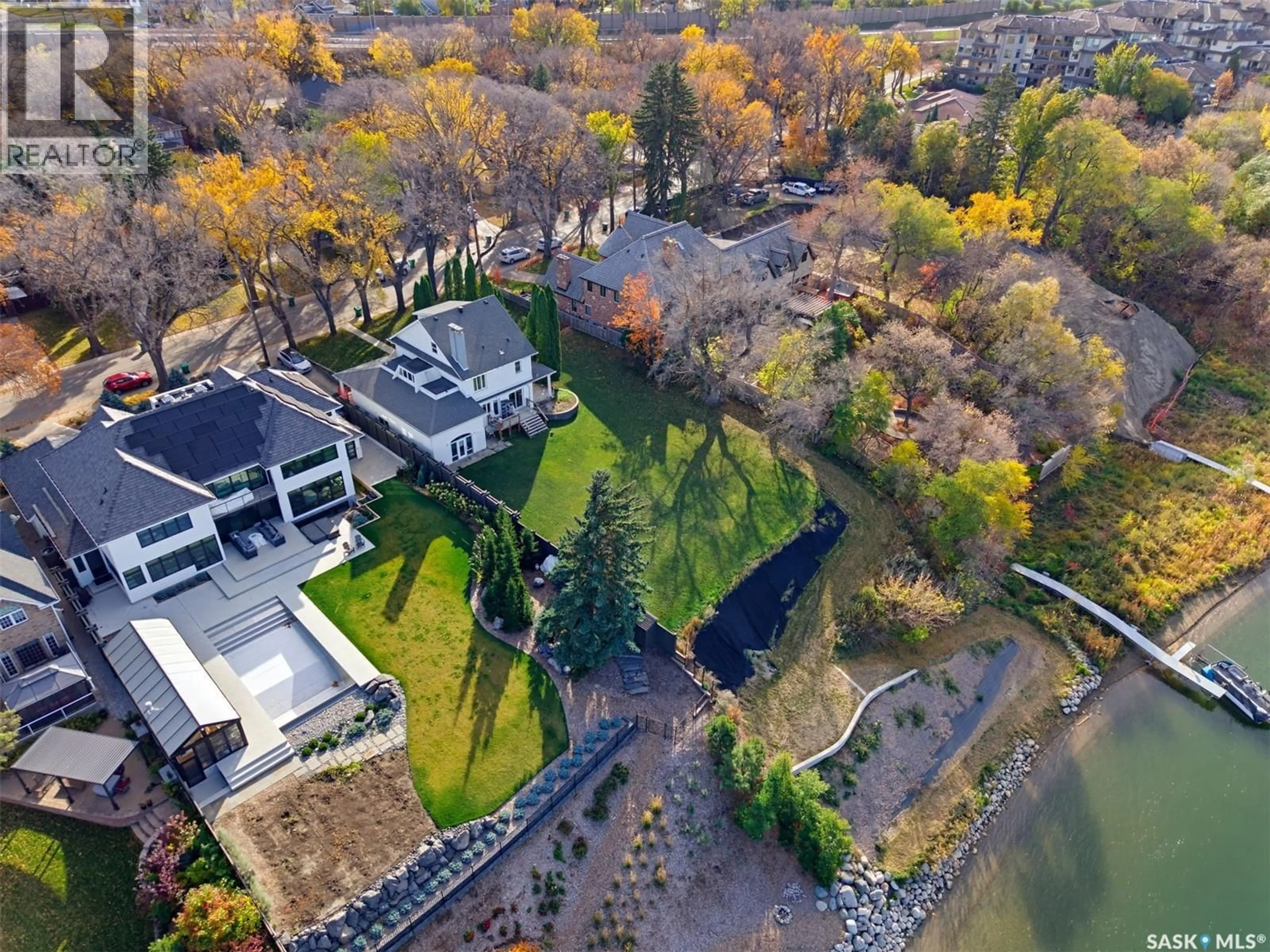 A pic from outside/outdoor area/front of a property/back of a property/a pic from drone, water/lake/river/ocean view for 327 SASKATCHEWAN CRESCENT, Saskatoon Saskatchewan S7M0A2