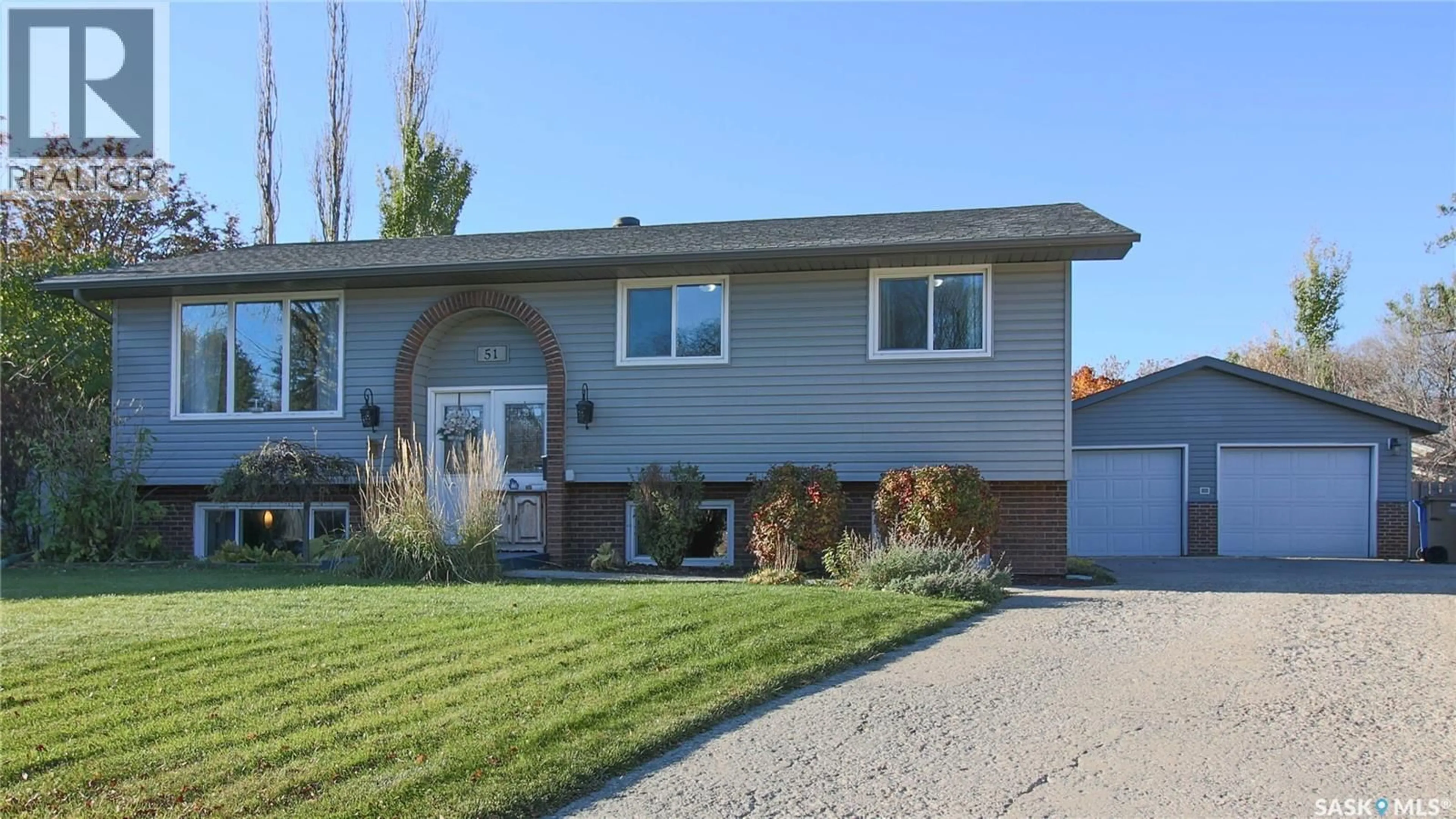 Home with vinyl exterior material, street for 51 FRENCH CRESCENT, Regina Saskatchewan S4R6N3