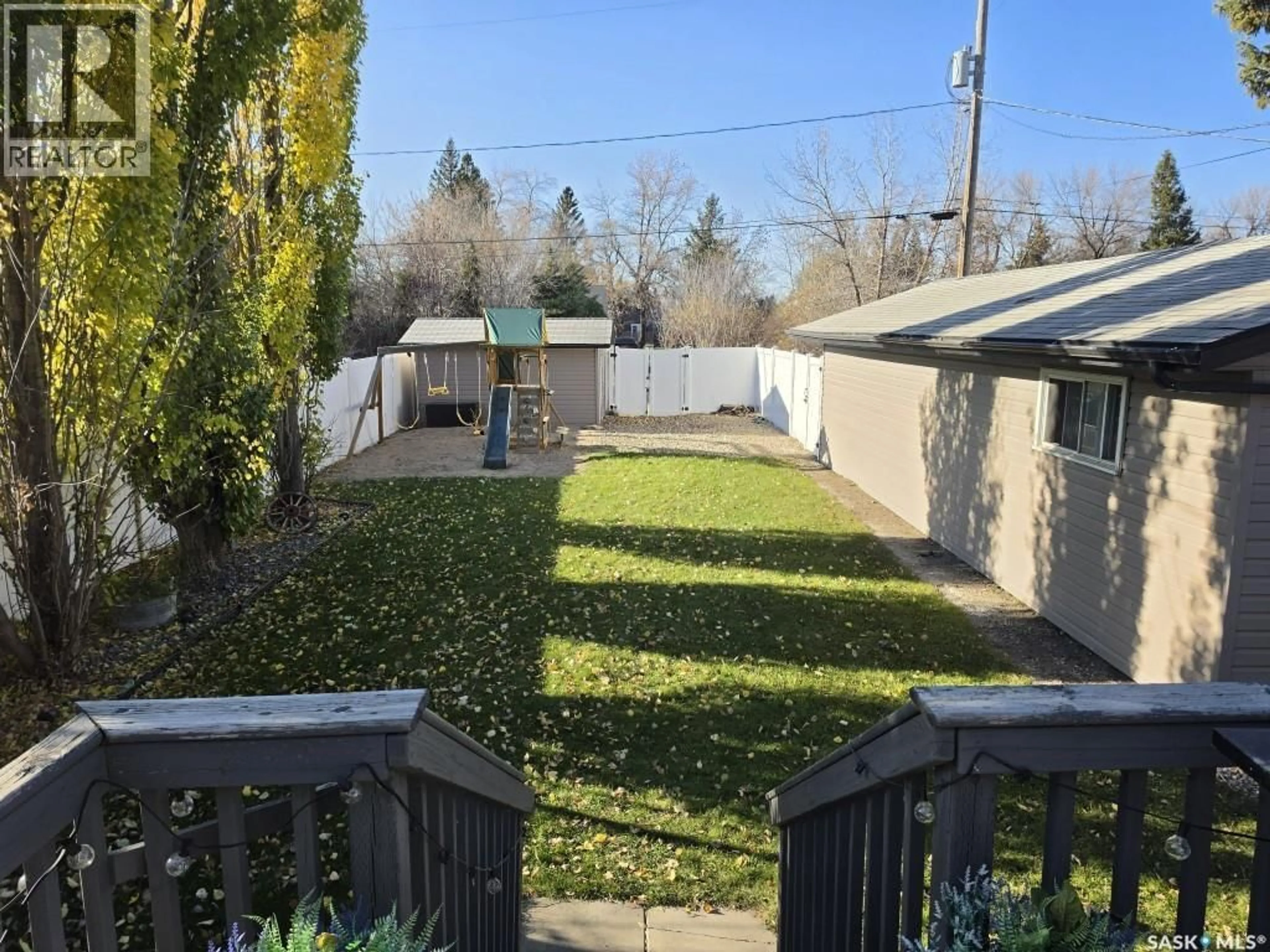 A pic from outside/outdoor area/front of a property/back of a property/a pic from drone, street for 107 2ND STREET, Watson Saskatchewan S0K4V0