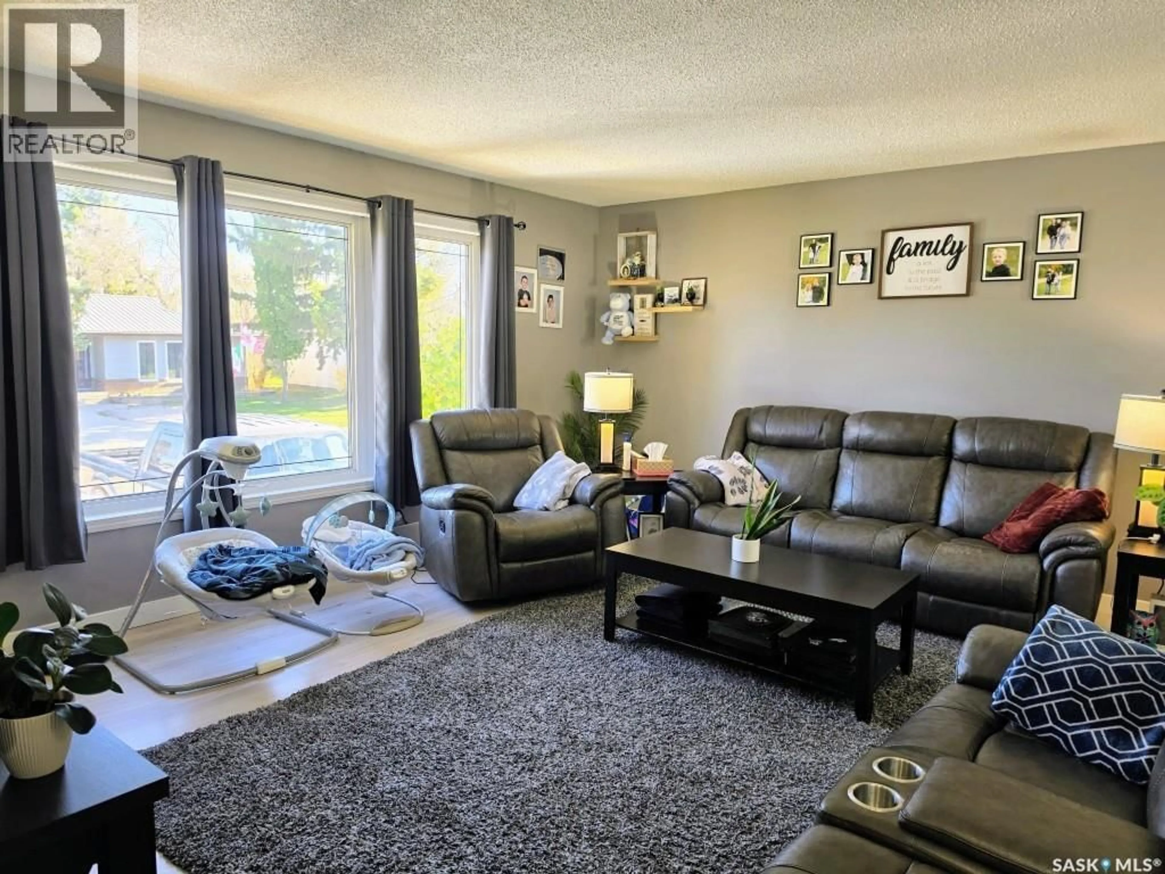 Living room with furniture, unknown for 107 2ND STREET, Watson Saskatchewan S0K4V0