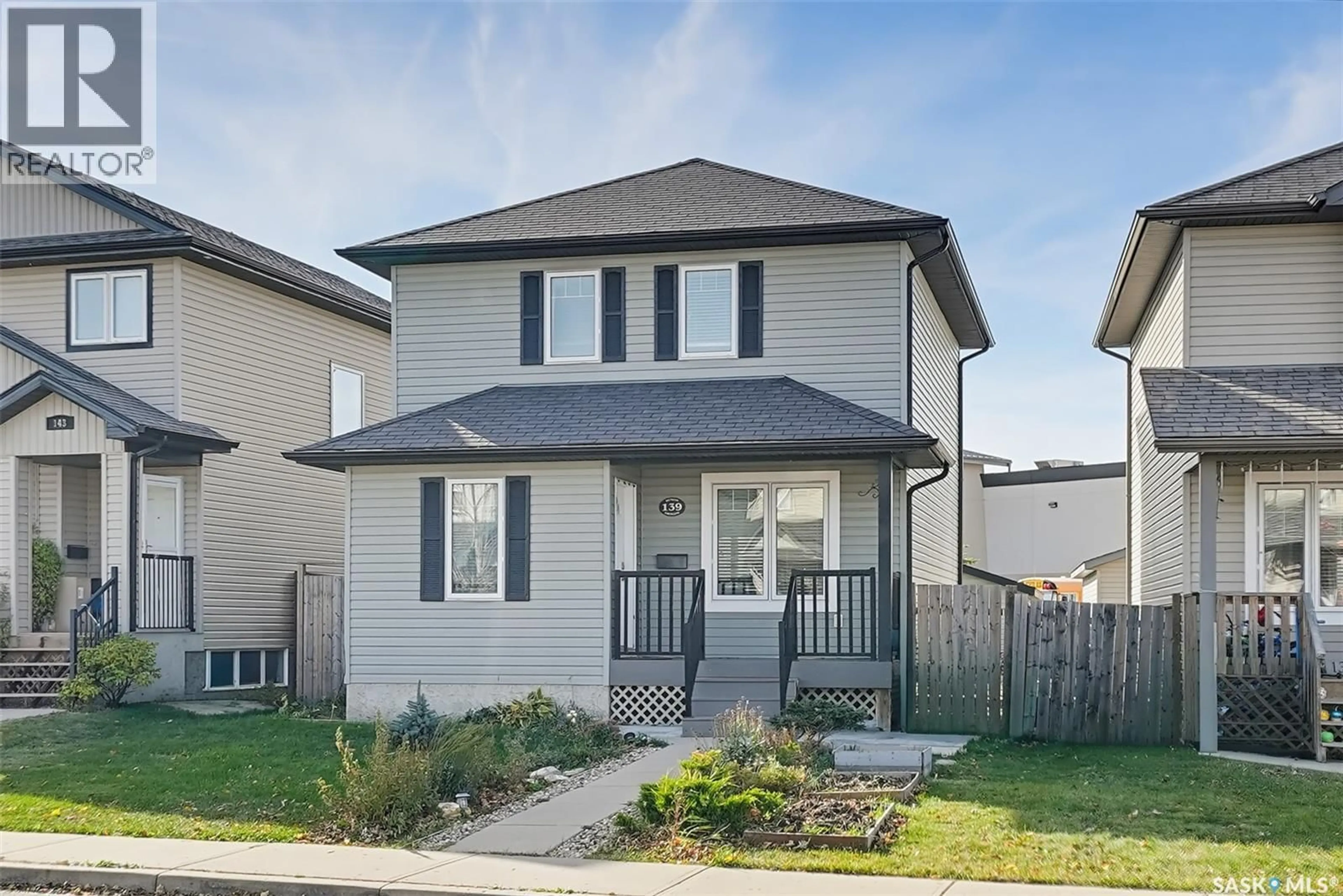 Home with vinyl exterior material, street for 139 DENHAM CRESCENT, Saskatoon Saskatchewan S7R1E9