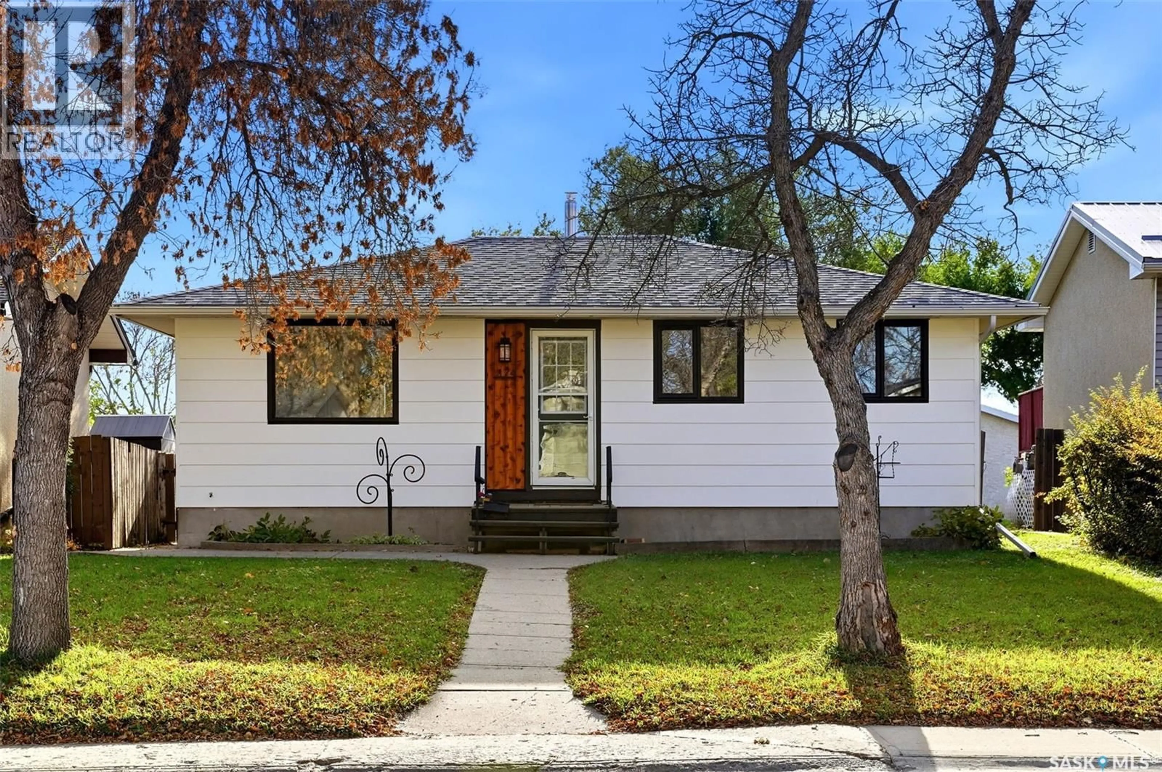 Home with vinyl exterior material, street for 174 TRUDELLE CRESCENT, Regina Saskatchewan S4T6T4