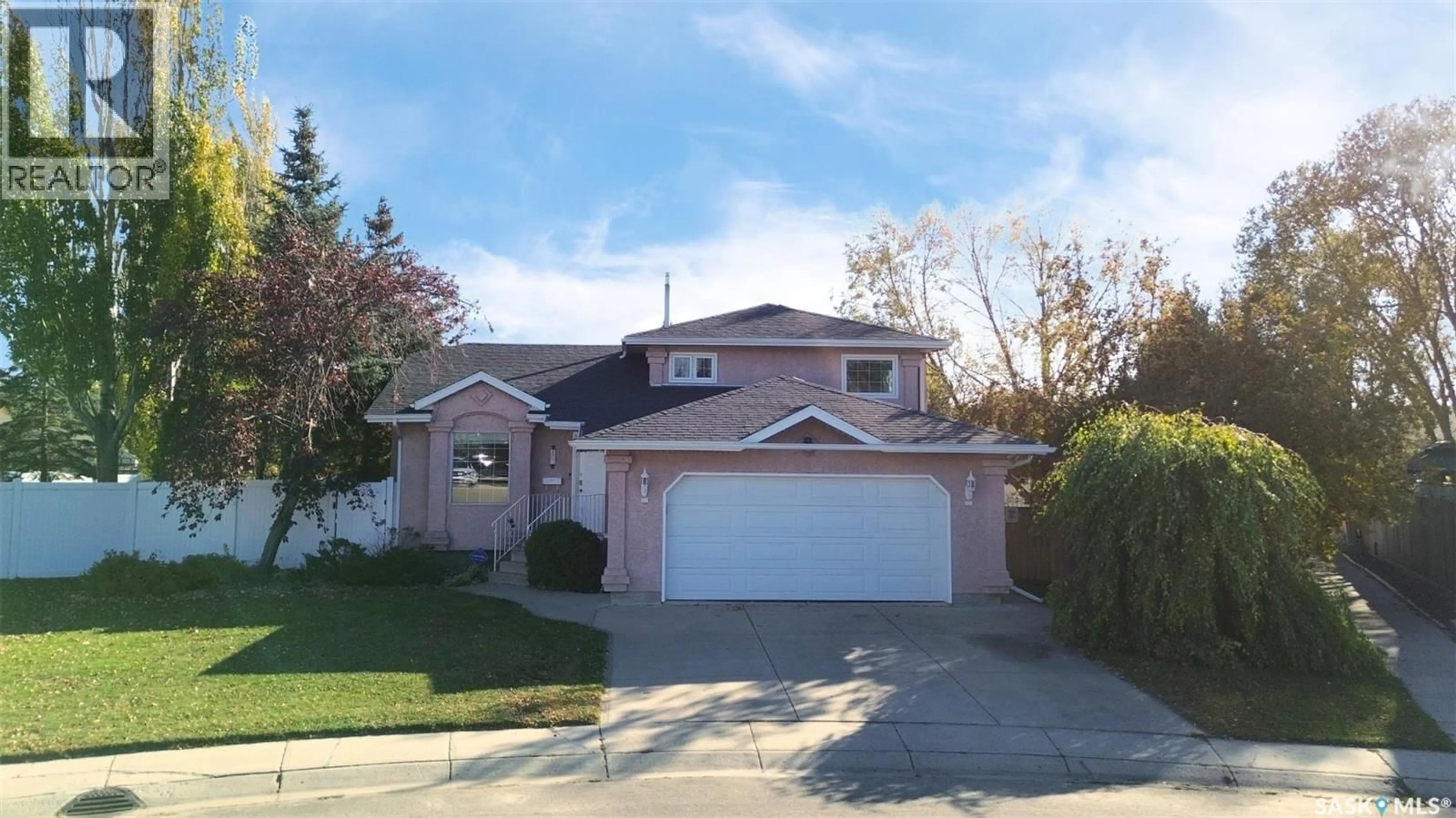 Home with vinyl exterior material, street for 803 SWAN CRESCENT, Saskatoon Saskatchewan S7J5C7