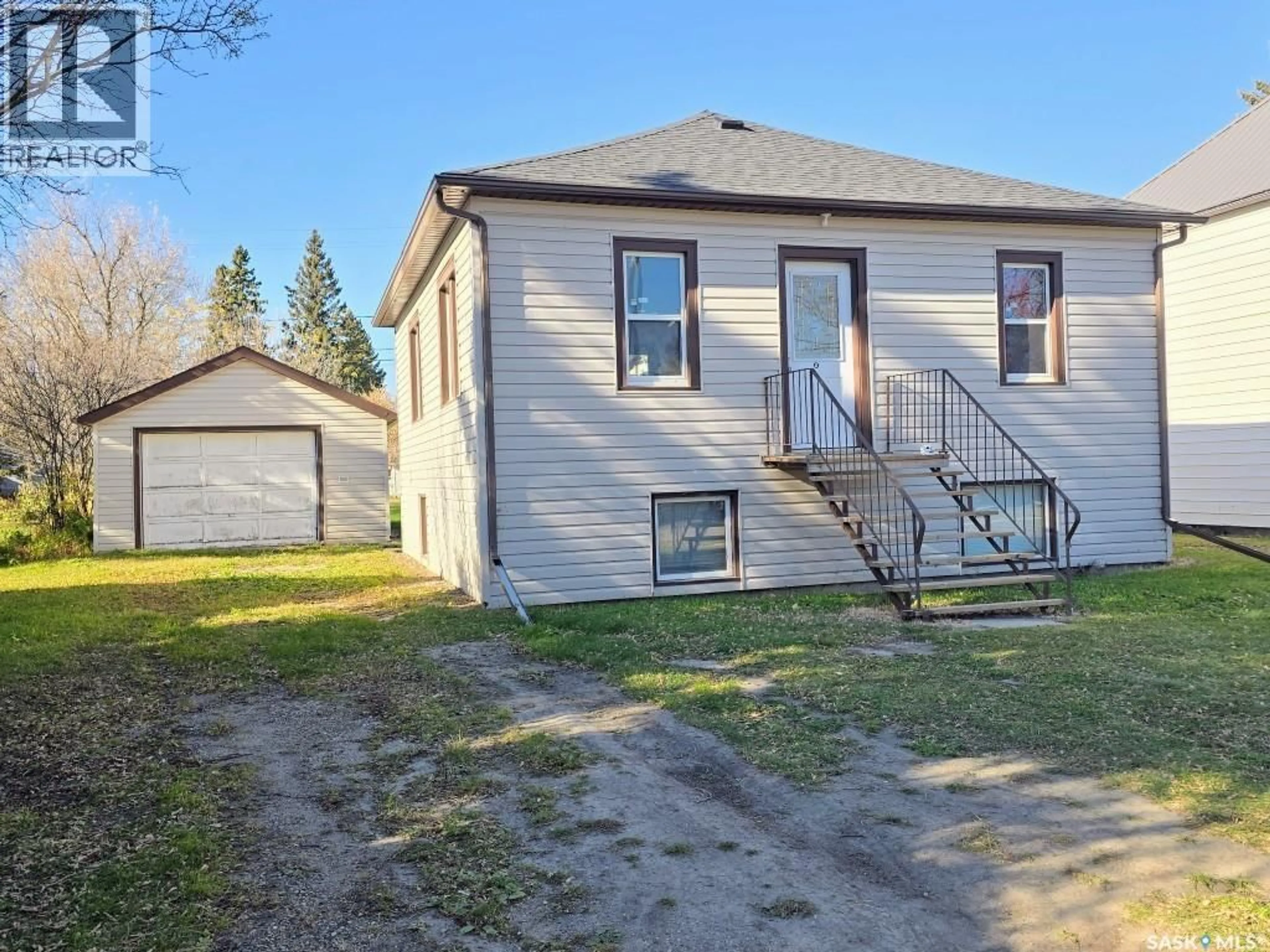 A pic from outside/outdoor area/front of a property/back of a property/a pic from drone, street for 319 9TH STREET, Humboldt Saskatchewan S0K2A0