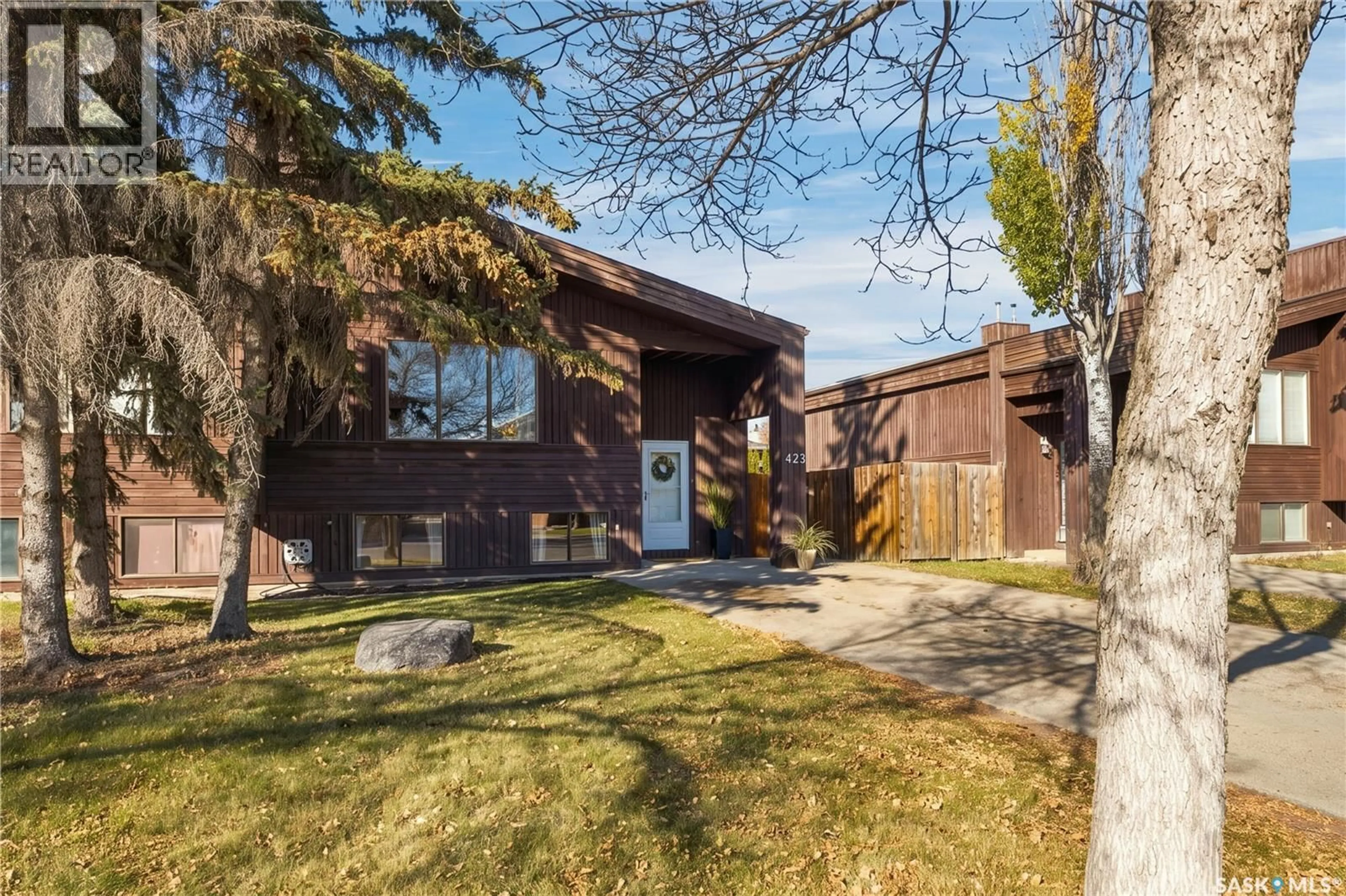 Home with brick exterior material, street for 423 RUSSELL ROAD, Saskatoon Saskatchewan S7K7A8