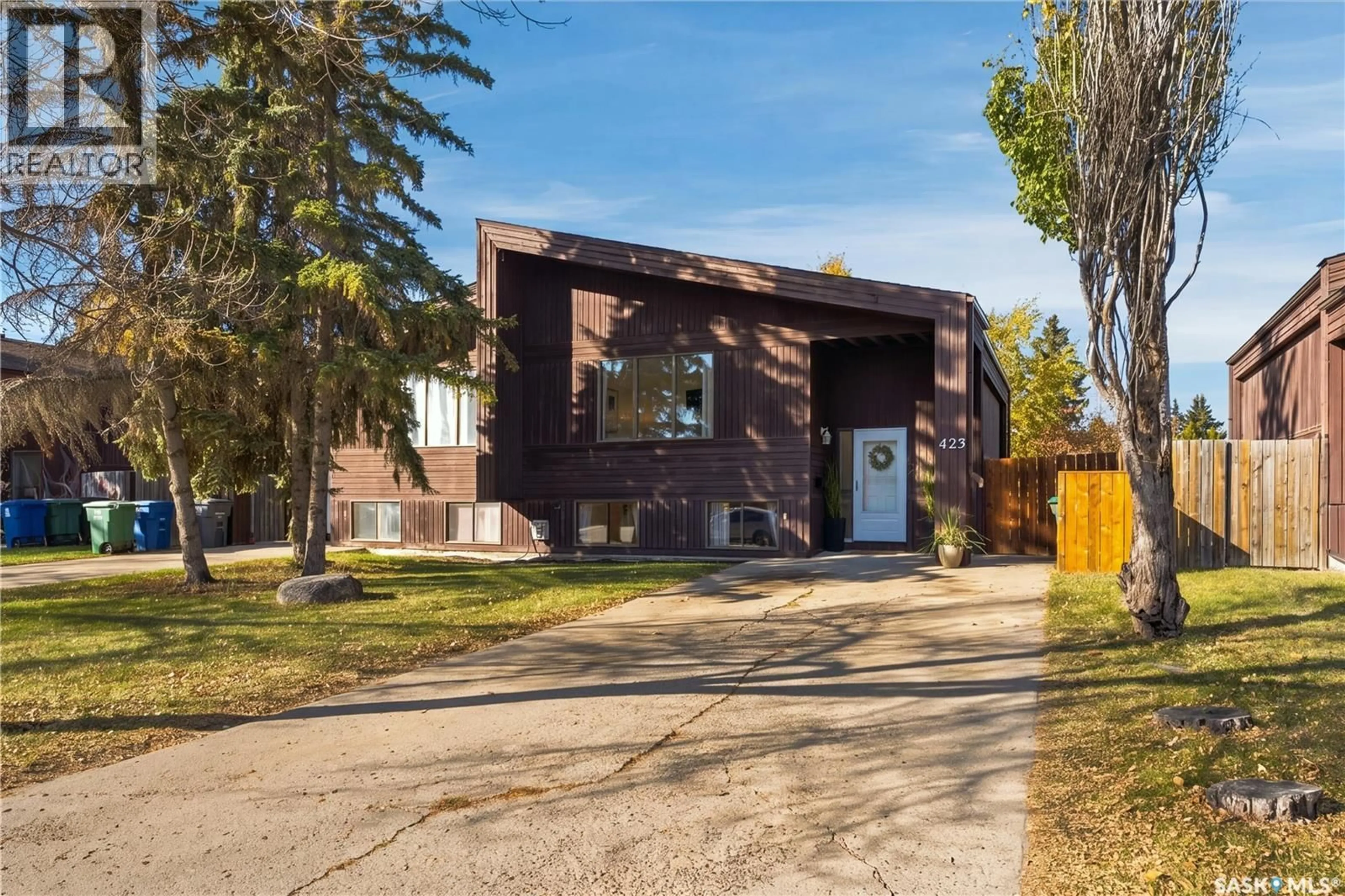 Home with brick exterior material, street for 423 RUSSELL ROAD, Saskatoon Saskatchewan S7K7A8