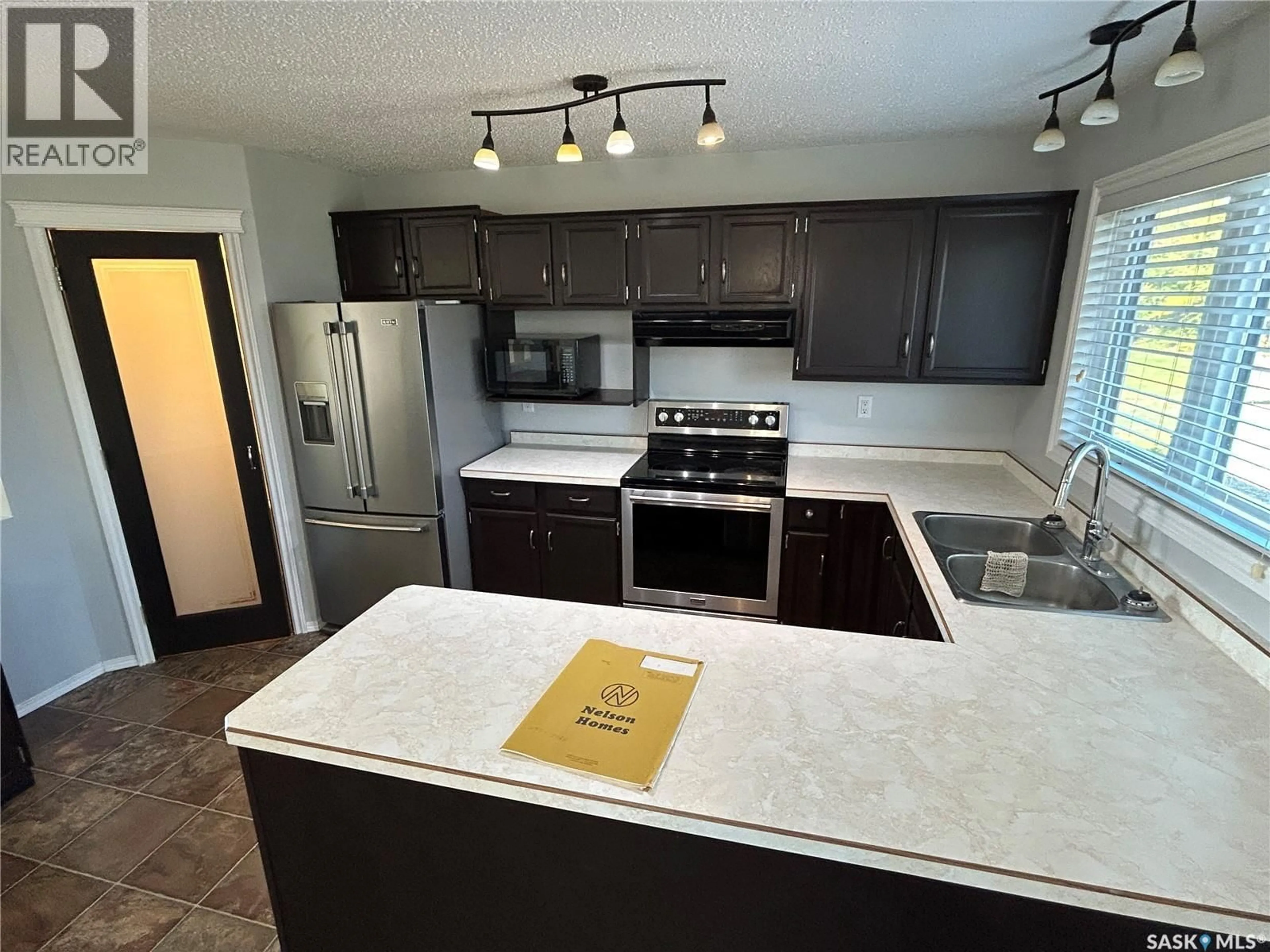 Open concept kitchen, ceramic/tile floor for 394 STANDARD STREET, Pennant Saskatchewan S0N1X0