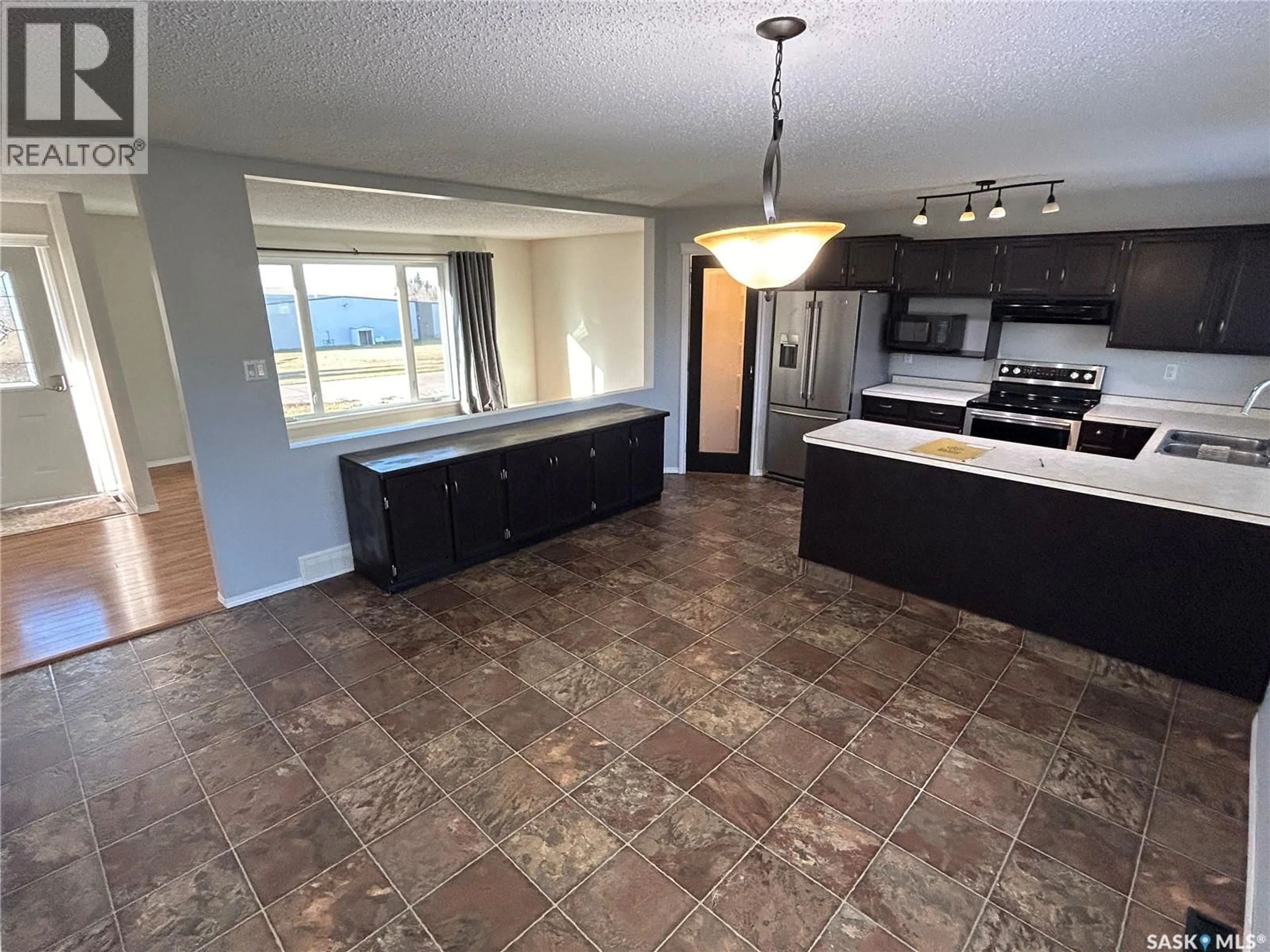Open concept kitchen, ceramic/tile floor for 394 STANDARD STREET, Pennant Saskatchewan S0N1X0