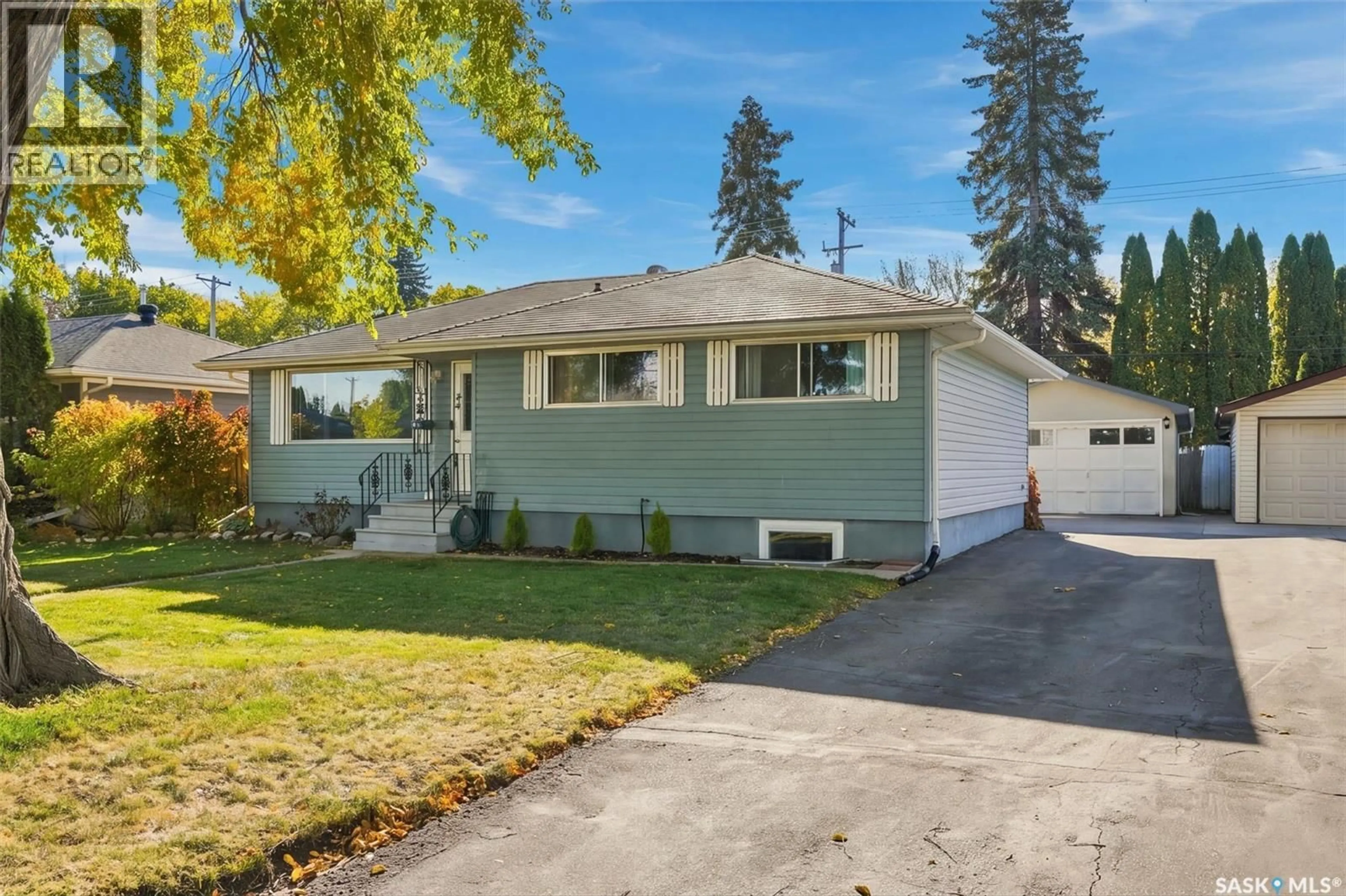 Home with vinyl exterior material, street for 34 MCASKILL CRESCENT, Saskatoon Saskatchewan S7J2P5