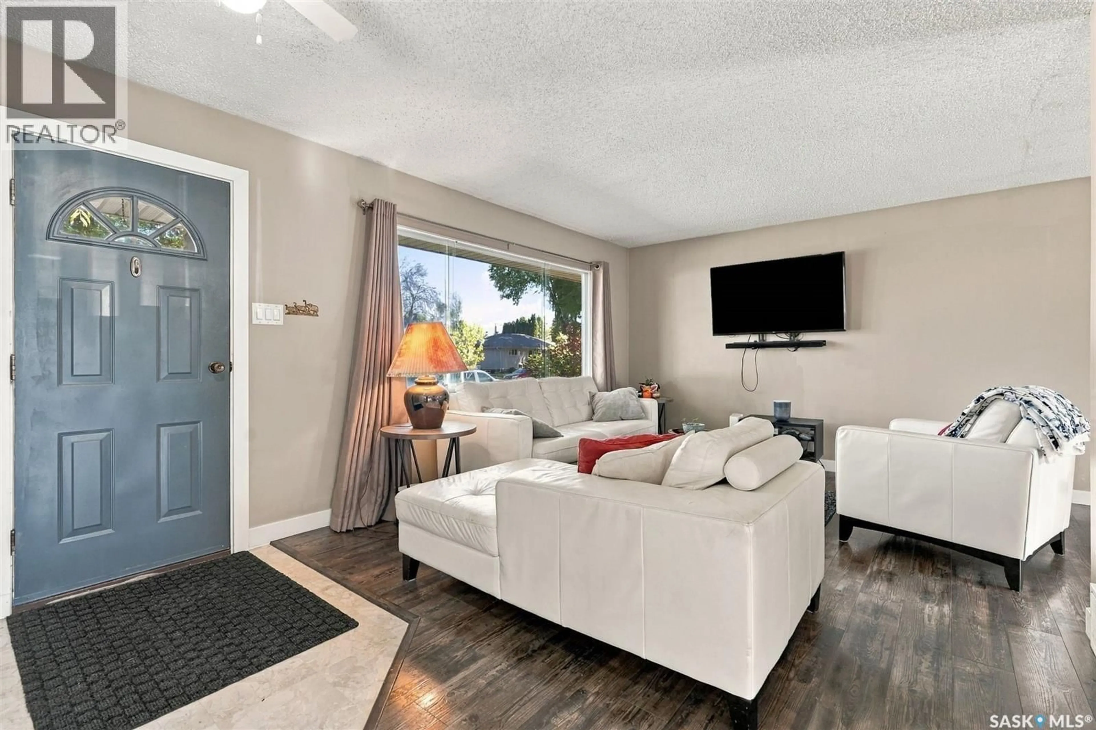 Living room with furniture, unknown for 34 MCASKILL CRESCENT, Saskatoon Saskatchewan S7J2P5
