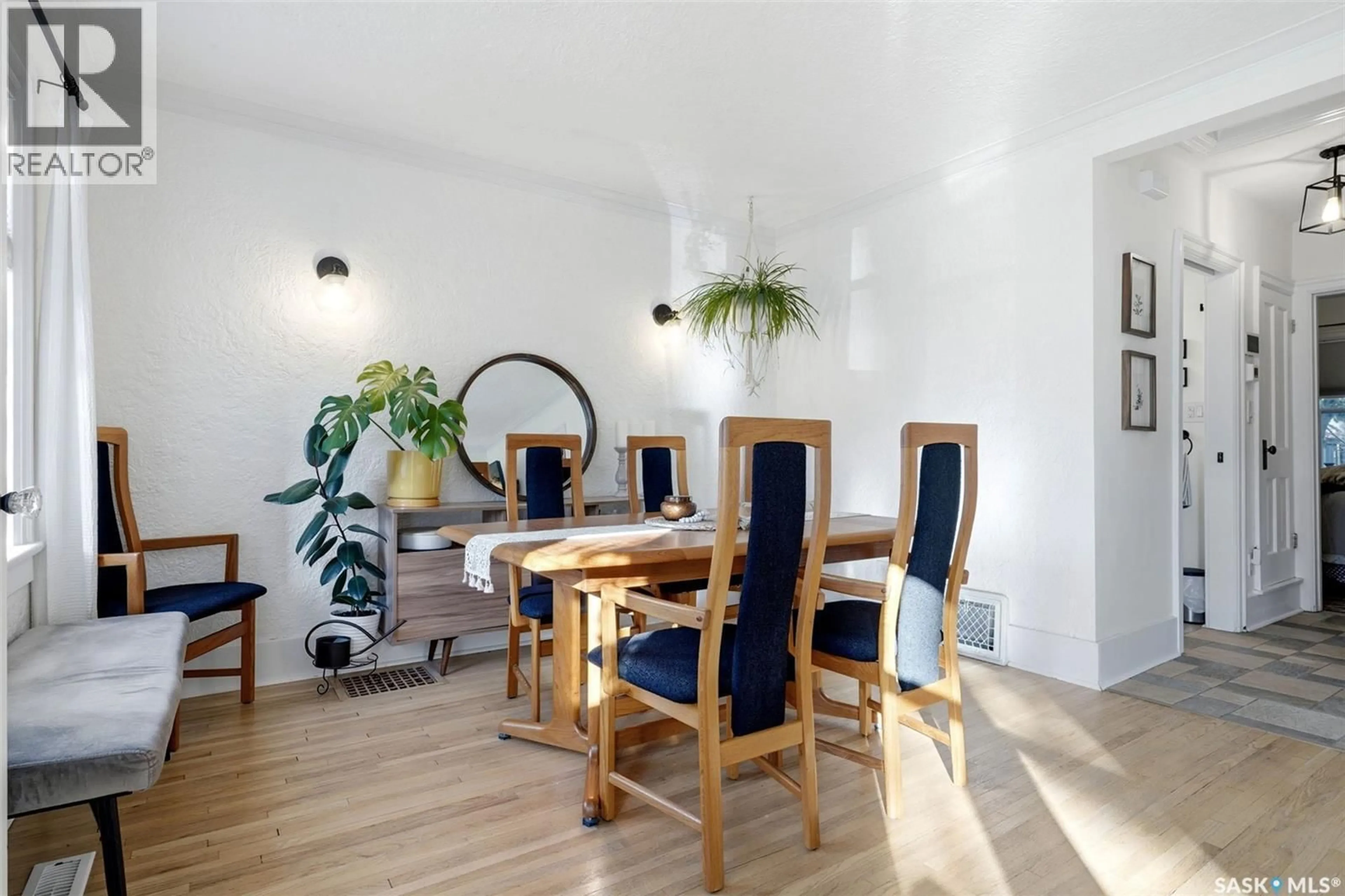 Dining room, wood/laminate floor for 2263 QUEEN STREET, Regina Saskatchewan S4T4C6