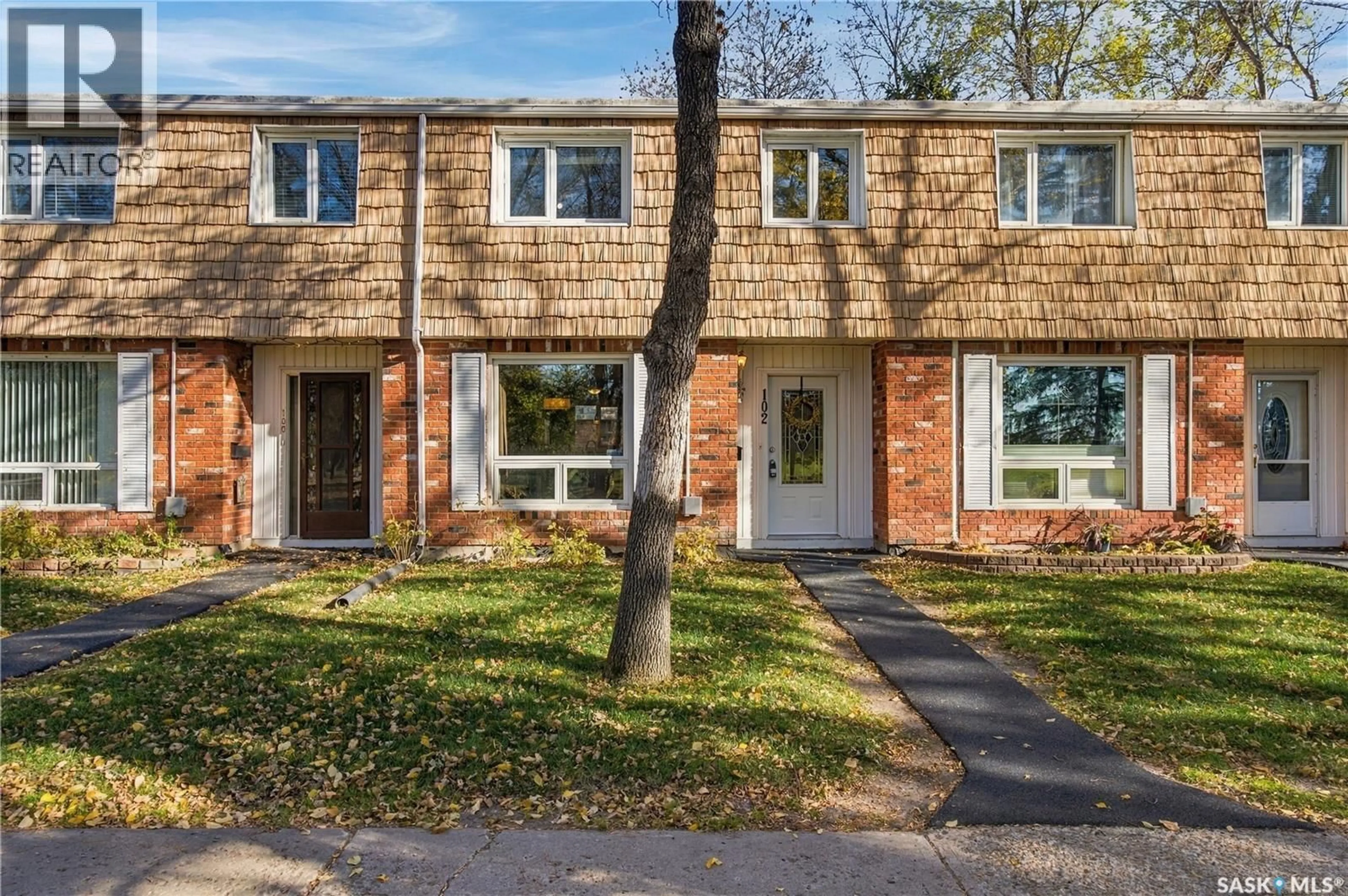Home with brick exterior material, street for 102 OAKVIEW DRIVE, Regina Saskatchewan S4R0E4