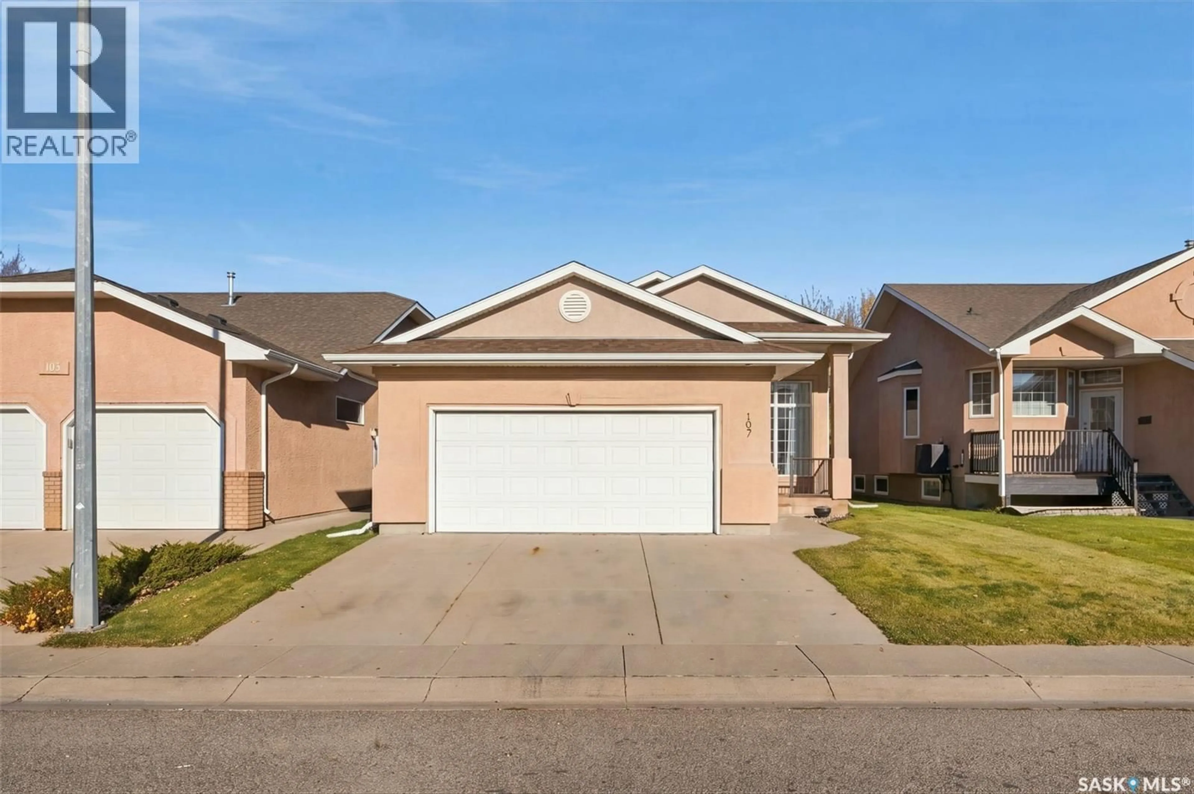 Home with brick exterior material, street for 107 SEARS COVE, Saskatoon Saskatchewan S7N4V5