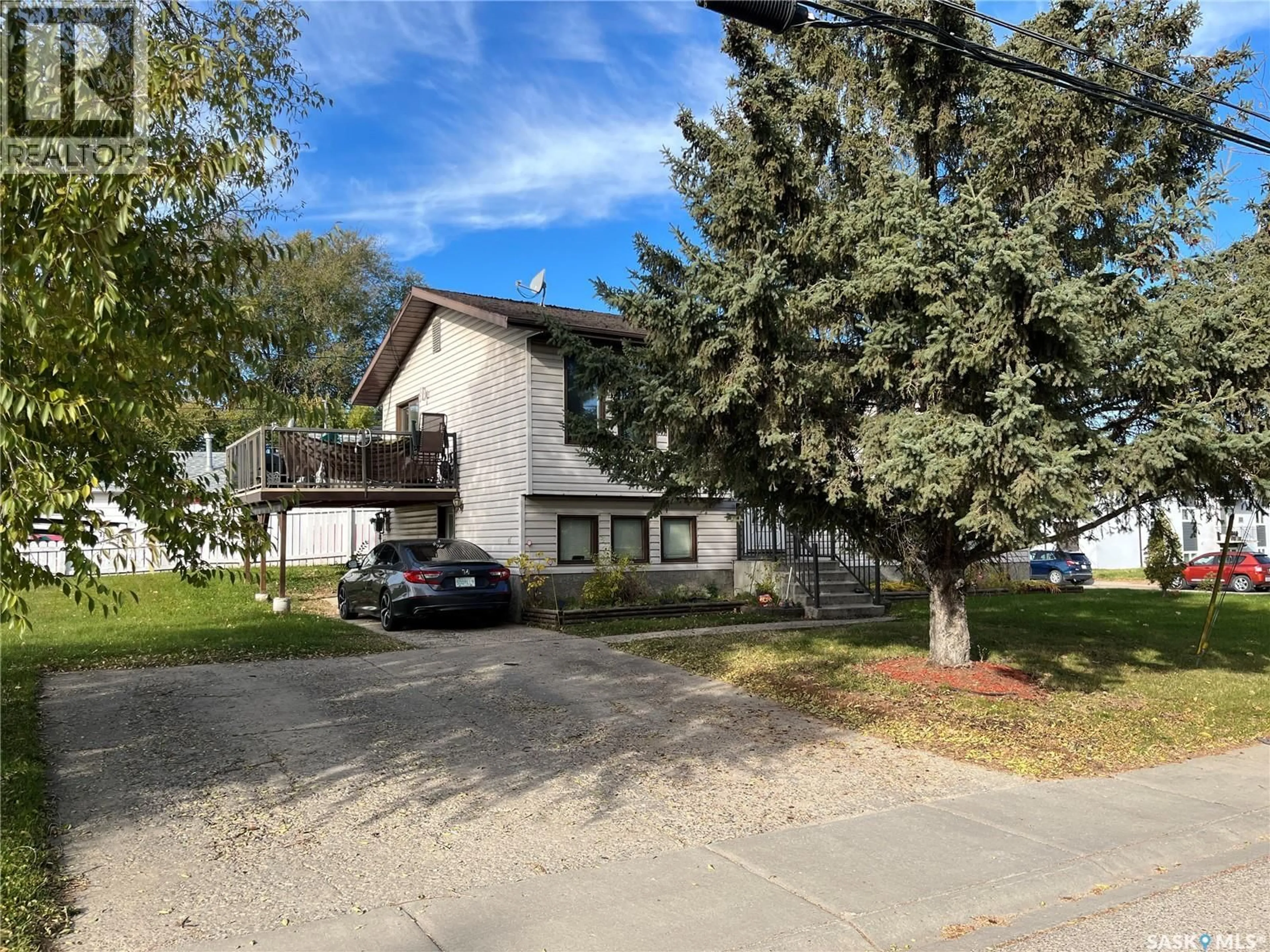 A pic from outside/outdoor area/front of a property/back of a property/a pic from drone, street for 2701 1ST AVENUE, Prince Albert Saskatchewan S6V5E6