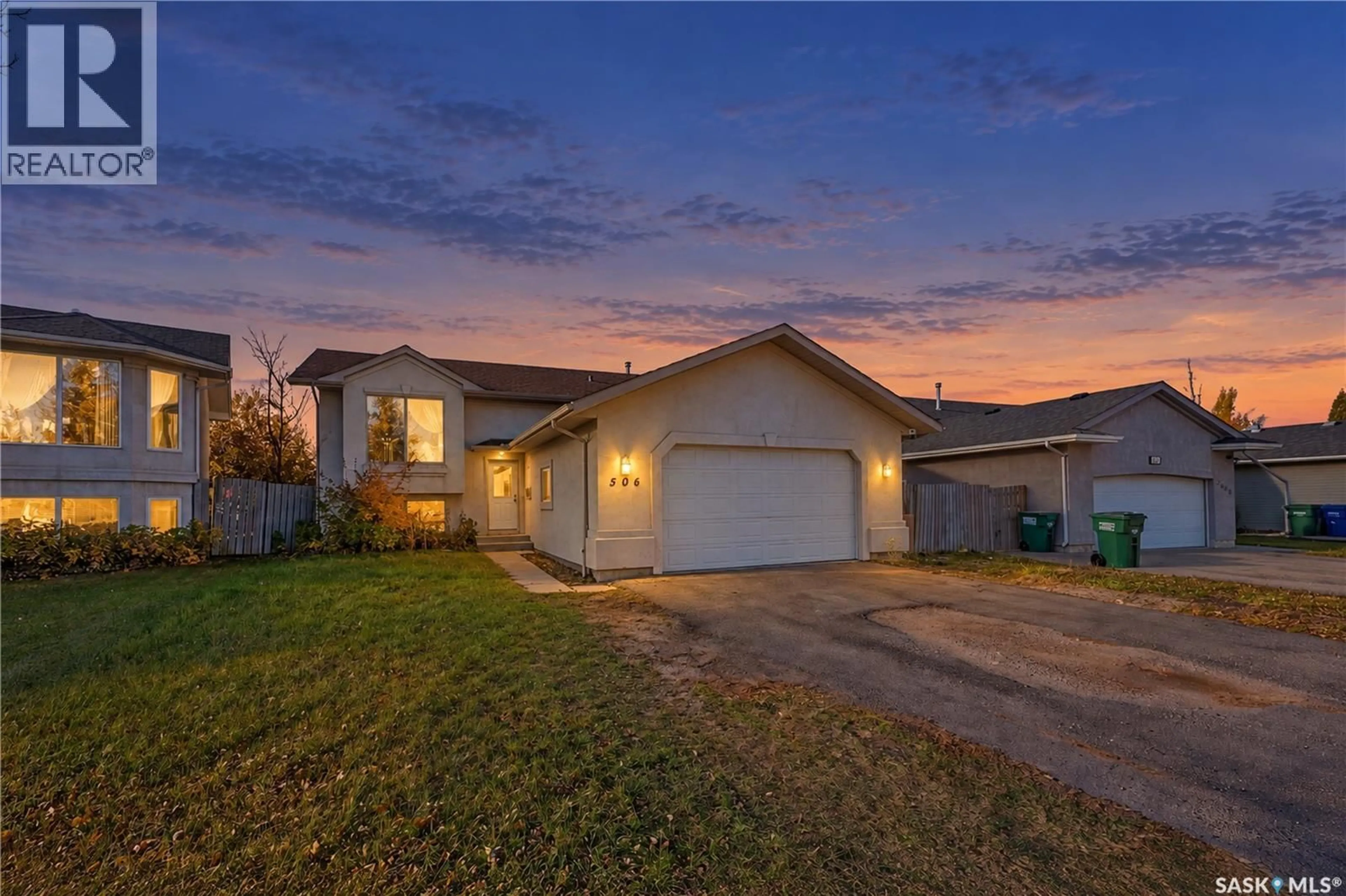 Home with vinyl exterior material, street for 506 KERR ROAD, Saskatoon Saskatchewan S7N4V3