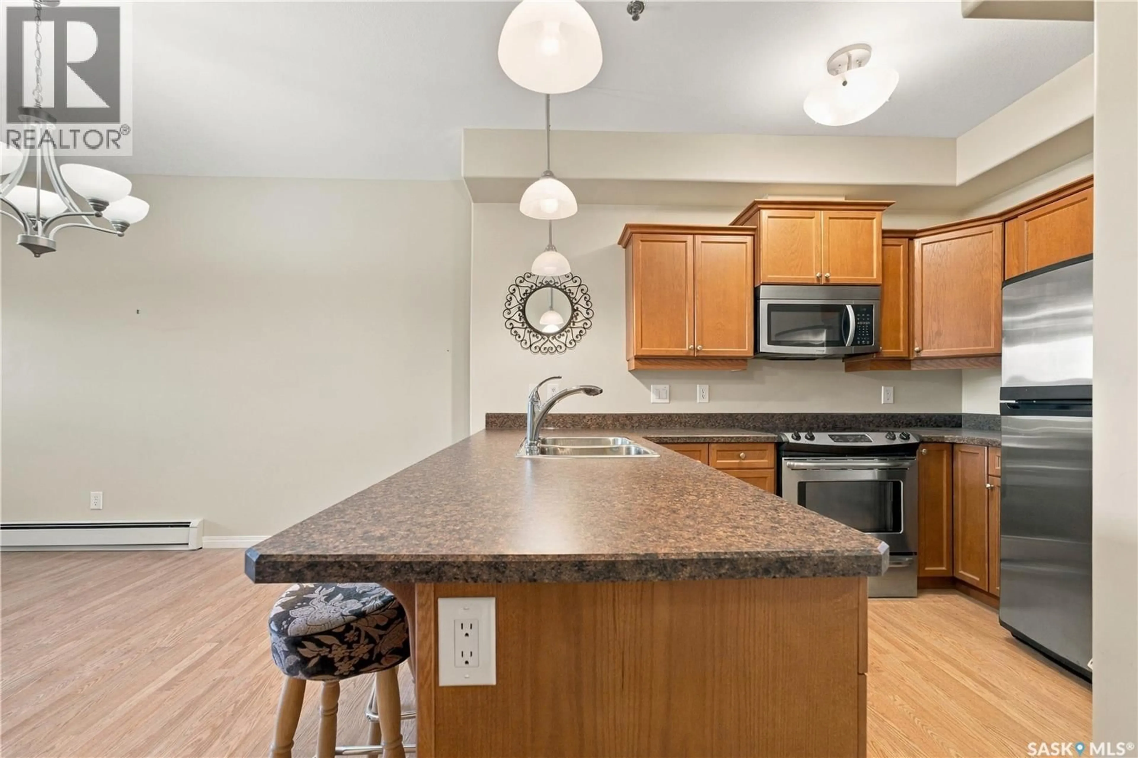 Open concept kitchen, unknown for 102 - 104 ARMISTICE WAY, Saskatoon Saskatchewan S7J2Z6