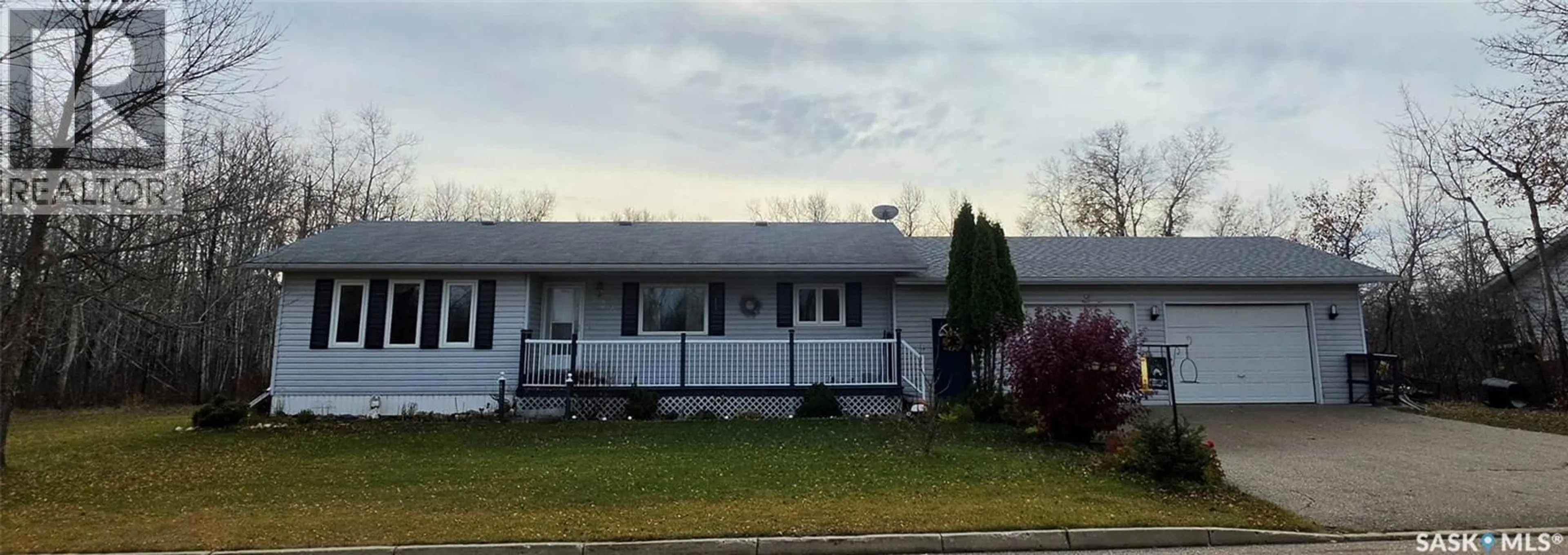 Home with vinyl exterior material, street for 526 6TH AVENUE, Preeceville Saskatchewan S0A3B0