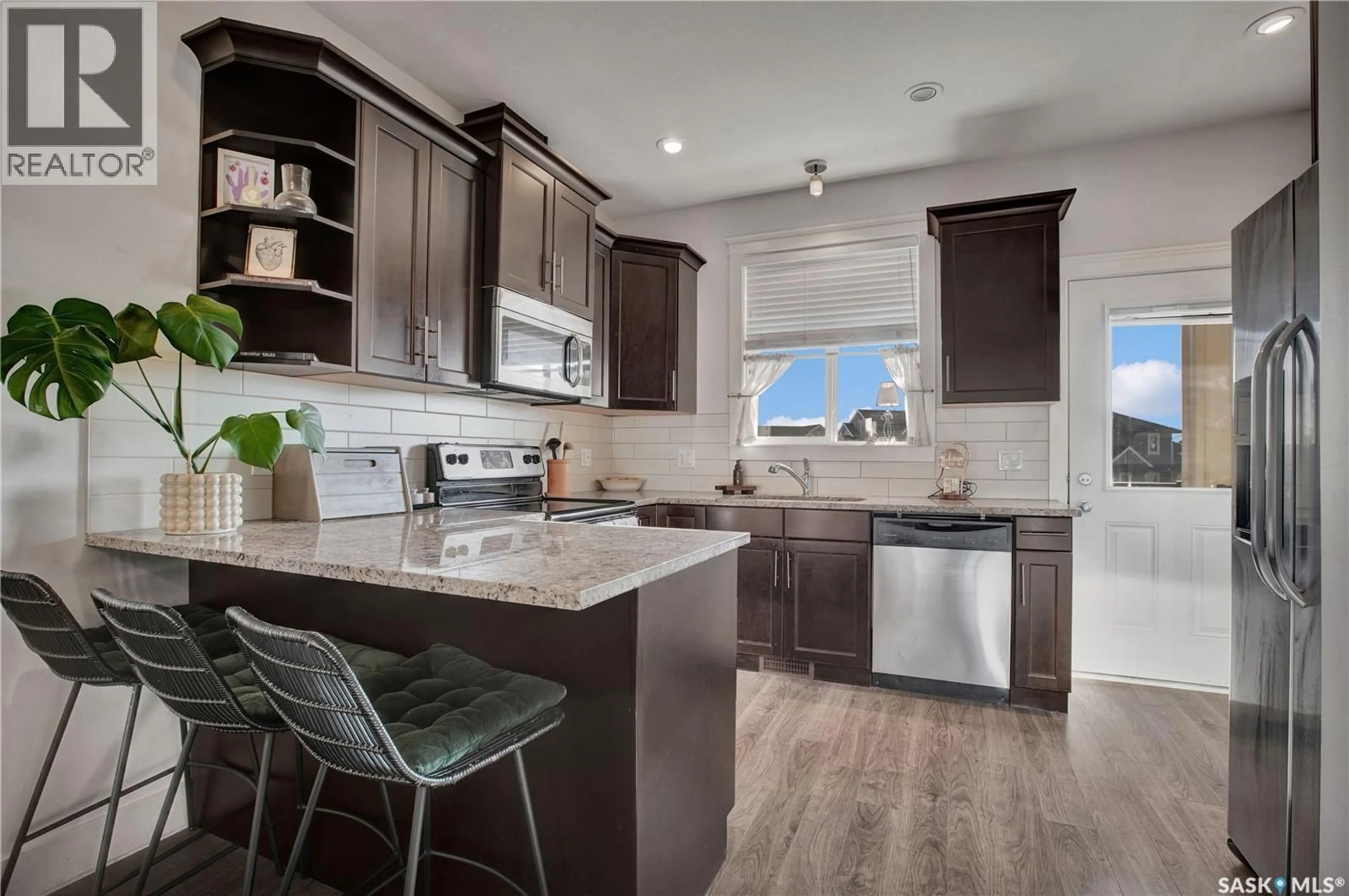 Open concept kitchen, ceramic/tile floor for 37 425 LANGER PLACE, Warman Saskatchewan S0K4S1