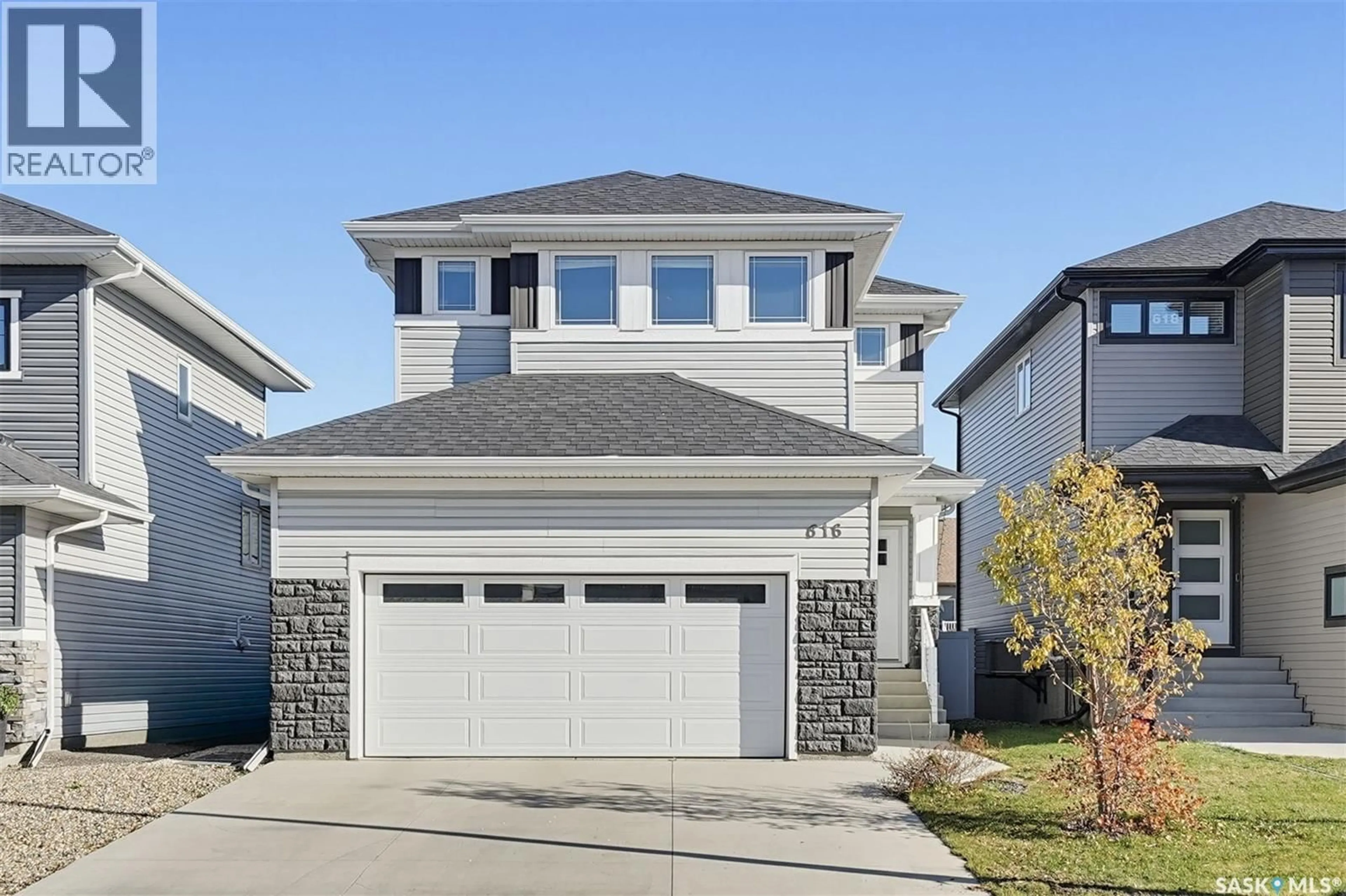 Home with vinyl exterior material, street for 616 MCFAULL CRESCENT, Saskatoon Saskatchewan S7V0T3