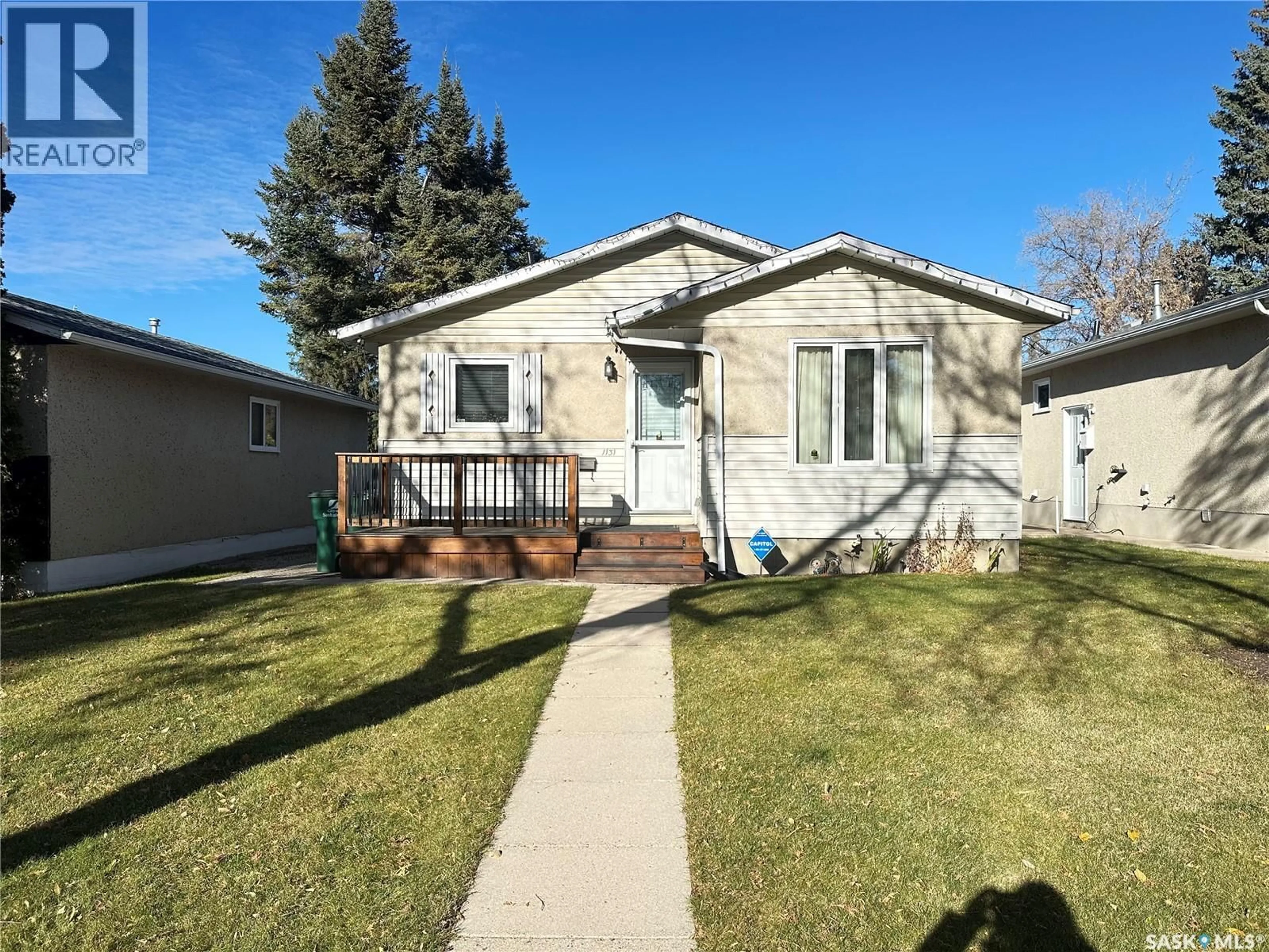 Home with vinyl exterior material, street for 1131 MACKLEM DRIVE, Saskatoon Saskatchewan S7L4R7
