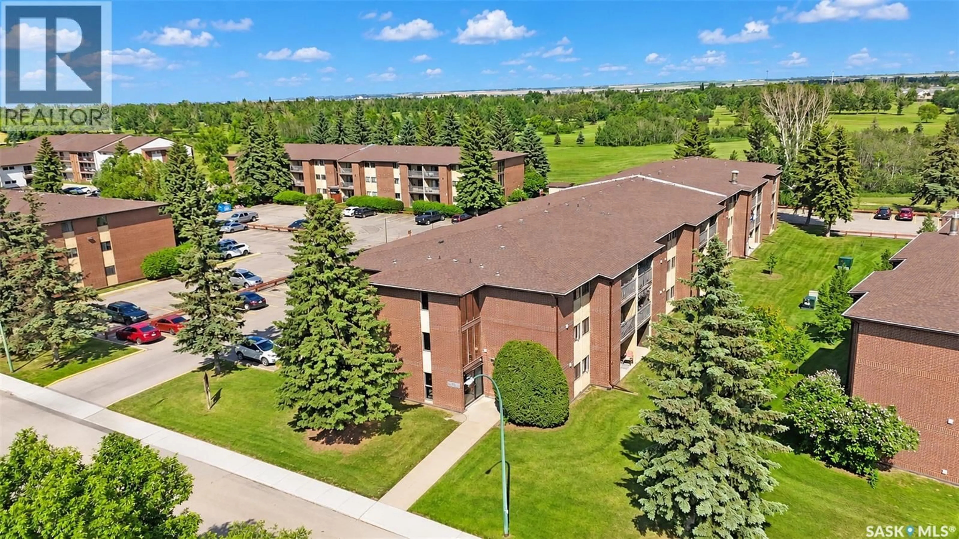 A pic from outside/outdoor area/front of a property/back of a property/a pic from drone, building for 309 315 TAIT CRESCENT, Saskatoon Saskatchewan S7H5L6