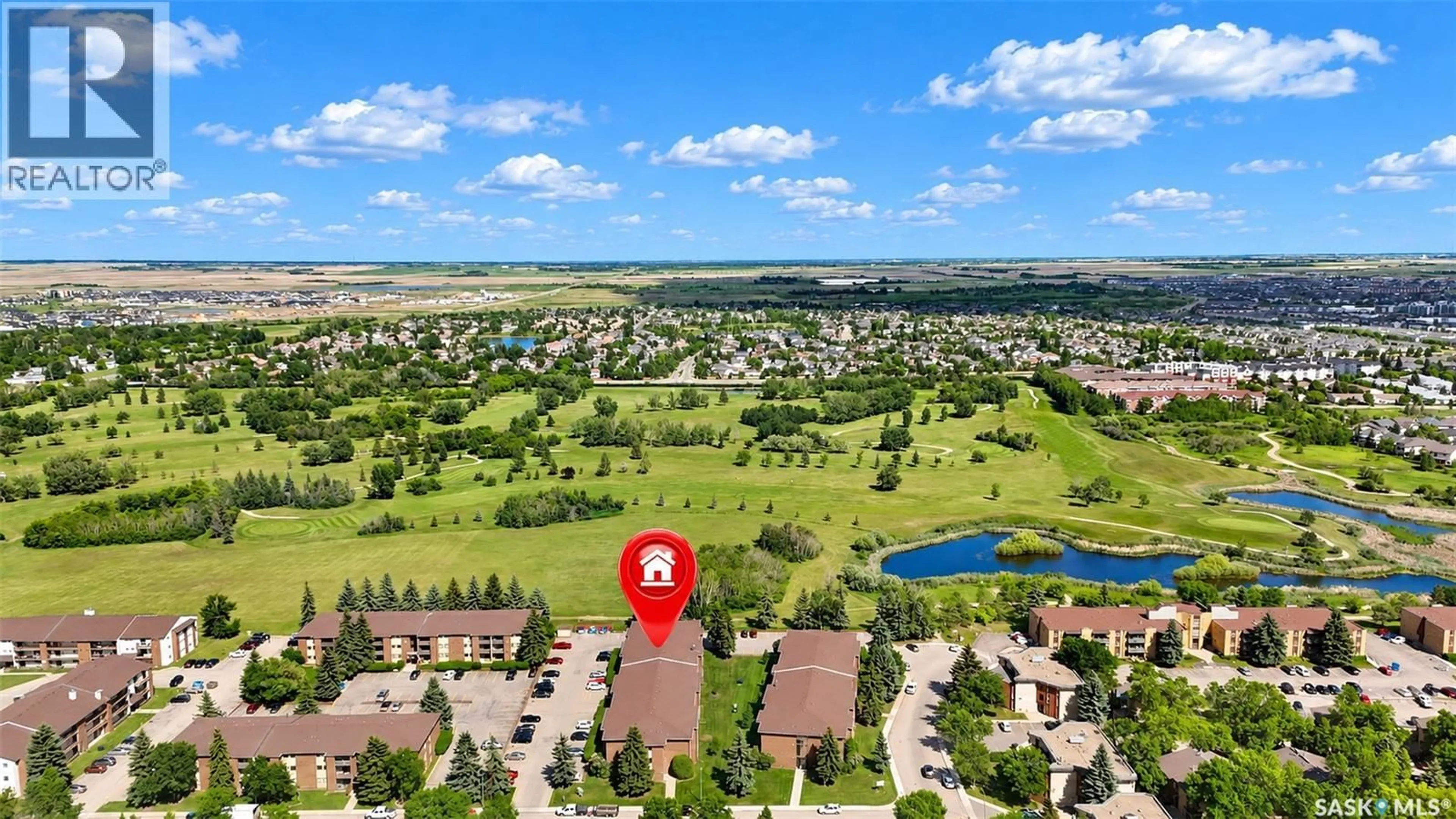 A pic from outside/outdoor area/front of a property/back of a property/a pic from drone, water/lake/river/ocean view for 309 315 TAIT CRESCENT, Saskatoon Saskatchewan S7H5L6