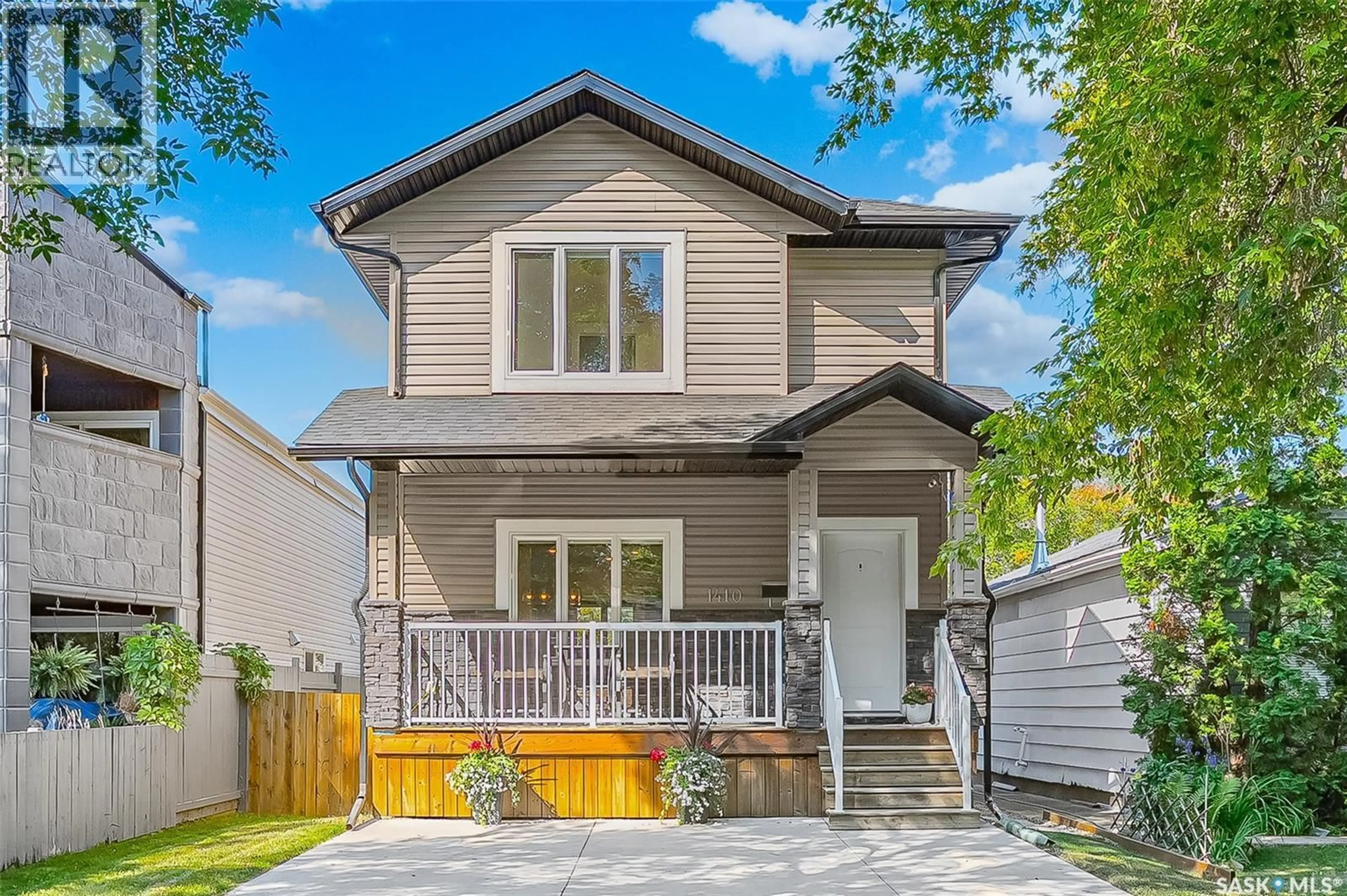Home with vinyl exterior material, street for 1410 COY AVENUE, Saskatoon Saskatchewan S7M0H4