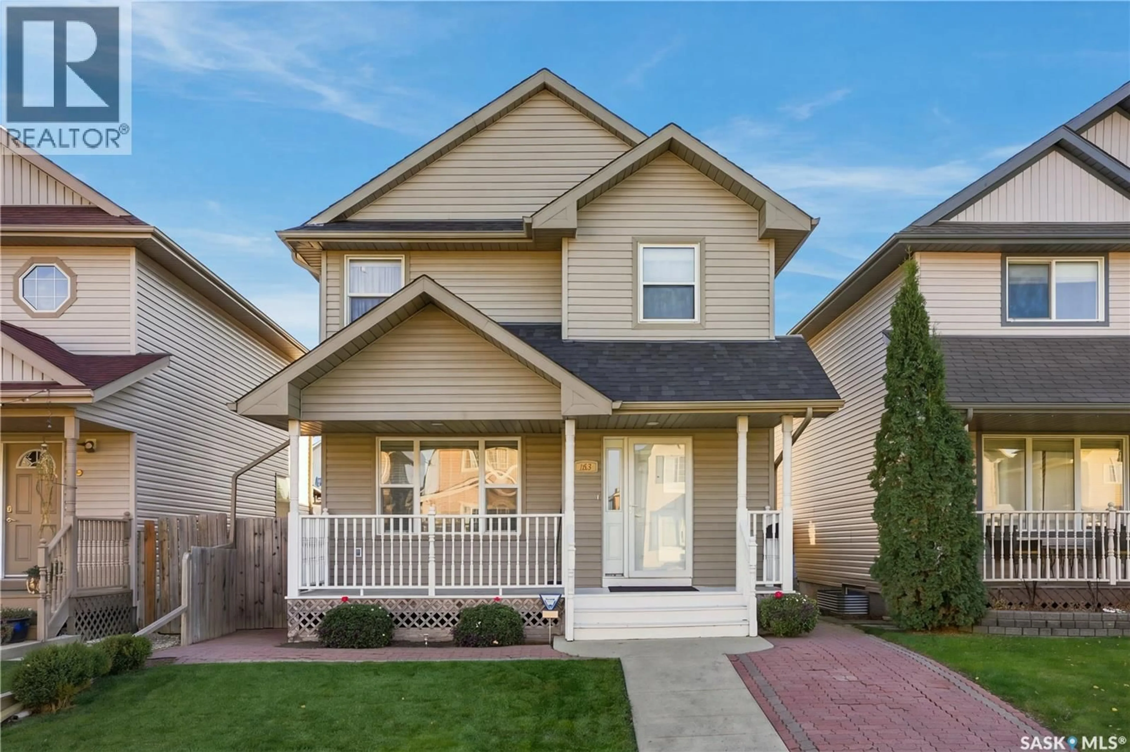 Home with vinyl exterior material, street for 163 BLAKENEY CRESCENT, Saskatoon Saskatchewan S7L7N5