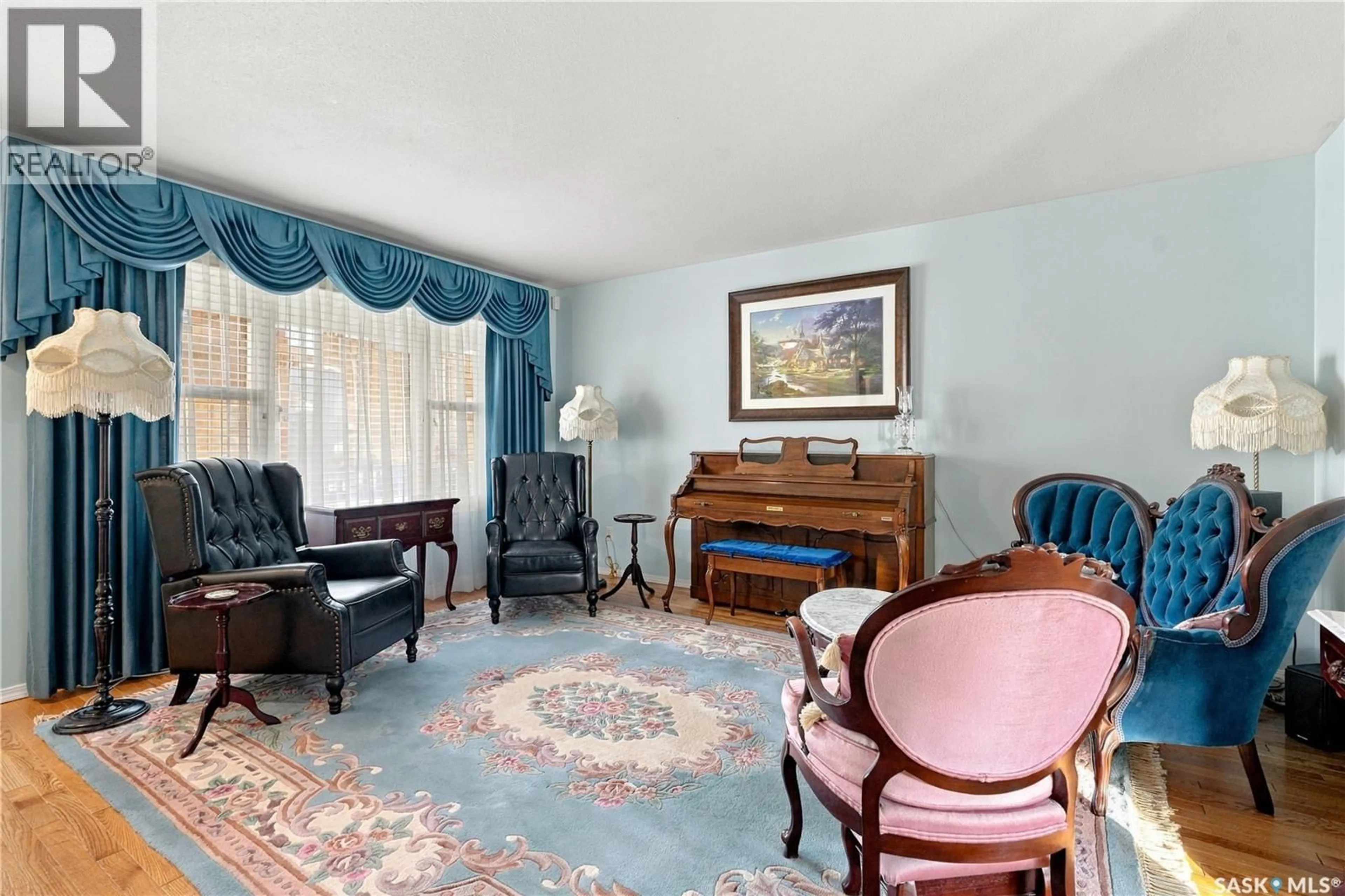 Living room with furniture, carpet floor for 163 BLAKENEY CRESCENT, Saskatoon Saskatchewan S7L7N5