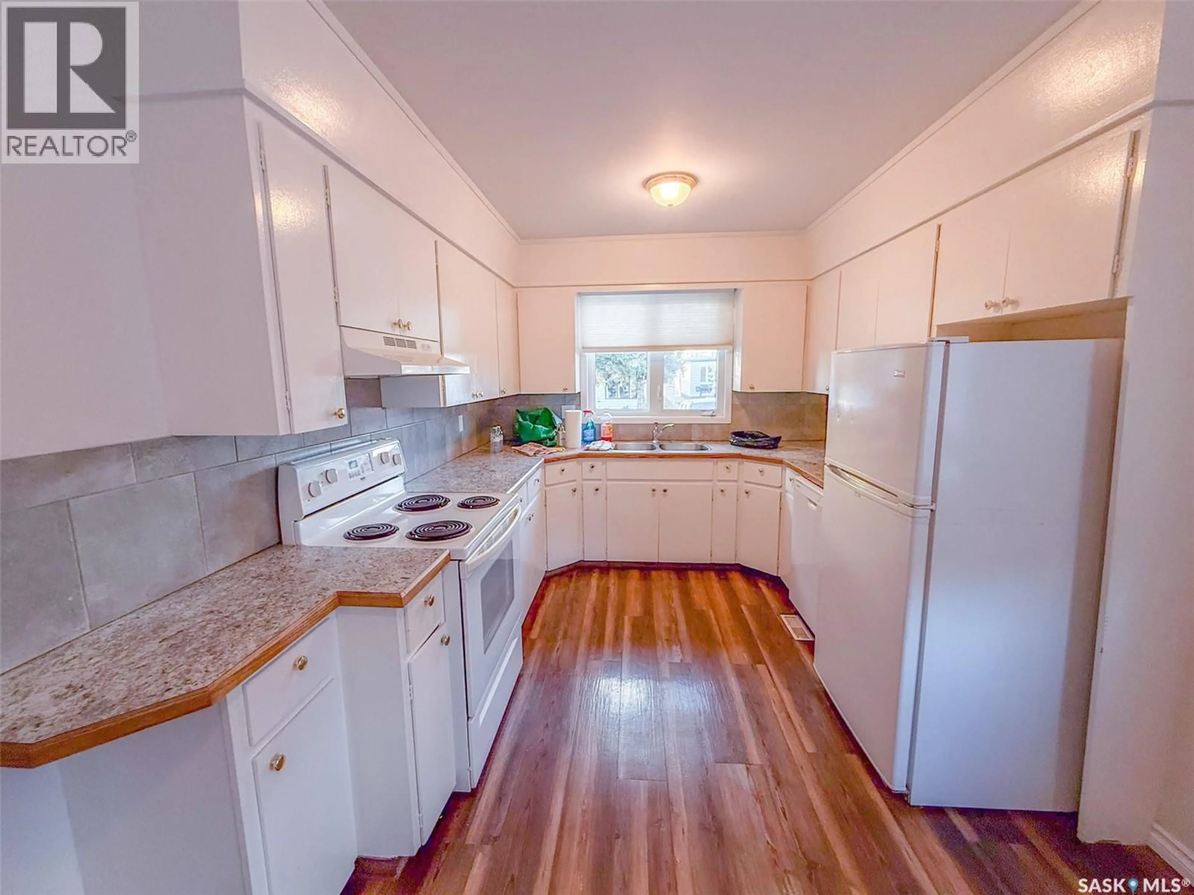 Standard kitchen, wood/laminate floor for 233 18TH AVENUE, Swift Current Saskatchewan S9H2Y2