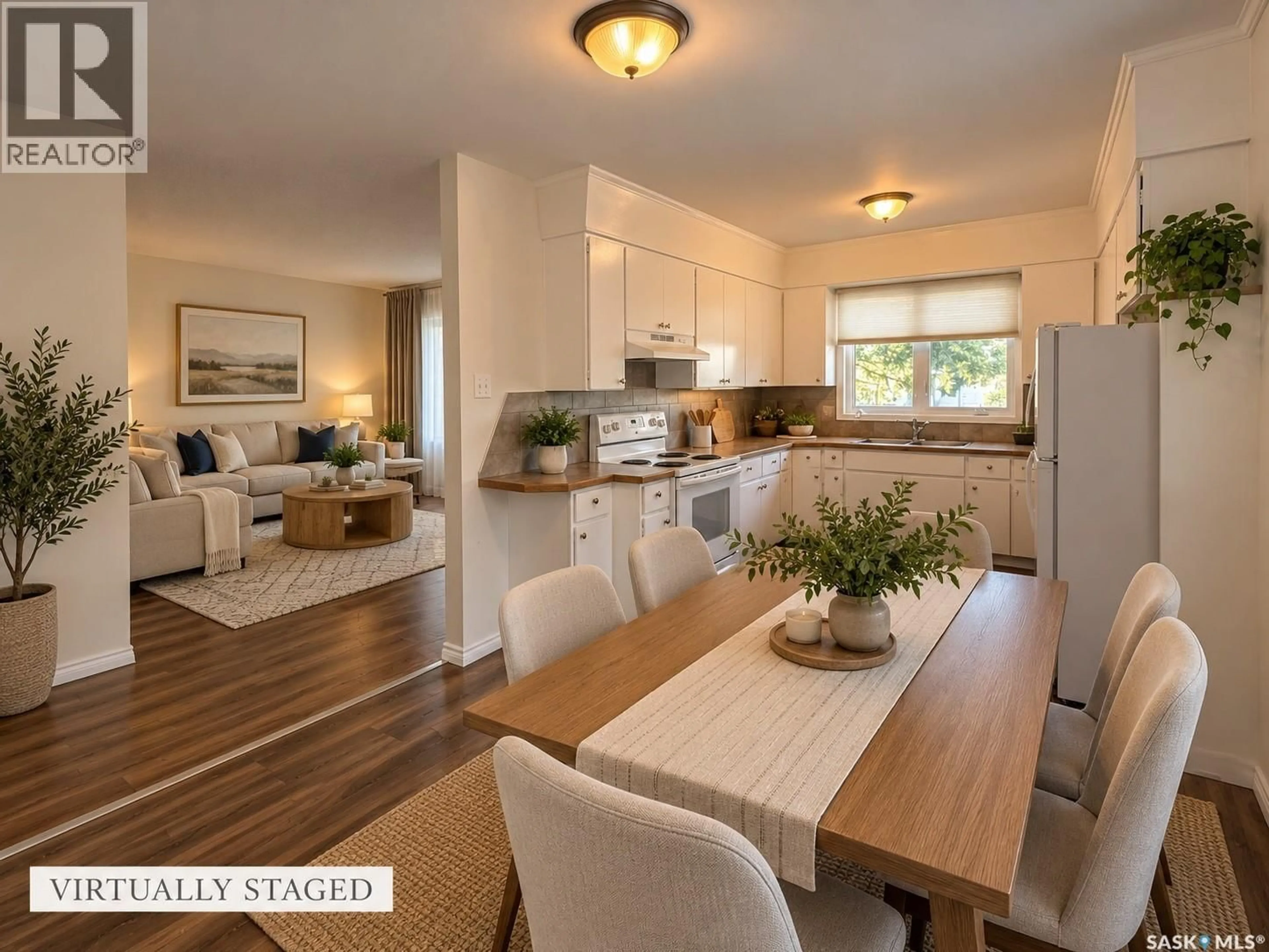 Open concept kitchen, wood/laminate floor for 233 18TH AVENUE, Swift Current Saskatchewan S9H2Y2