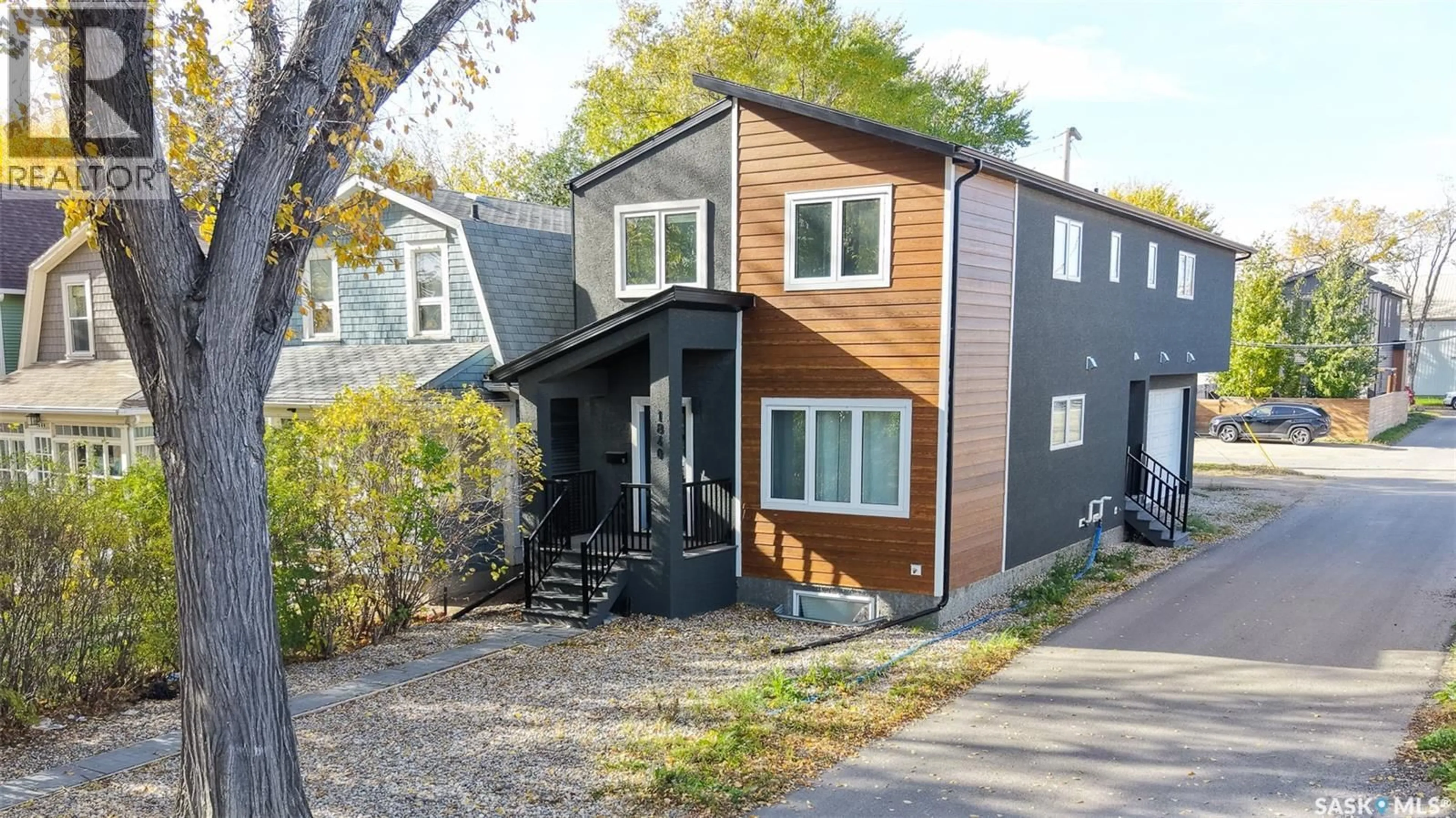 Home with vinyl exterior material, street for 1840 RETALLACK STREET, Regina Saskatchewan S4T2J7