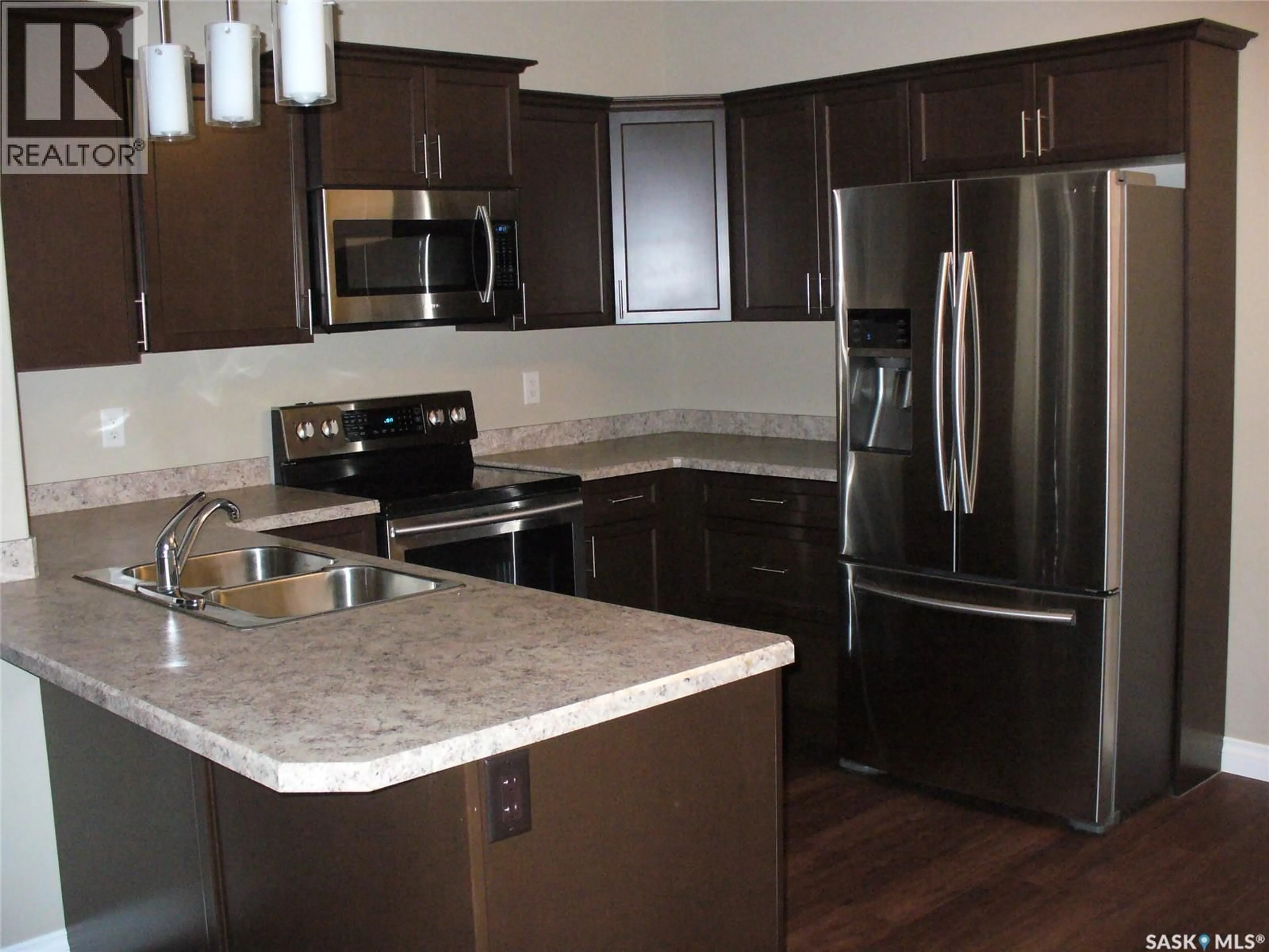 Open concept kitchen, unknown for 410 3630 HAUGHTON ROAD E, Regina Saskatchewan S4V1P1