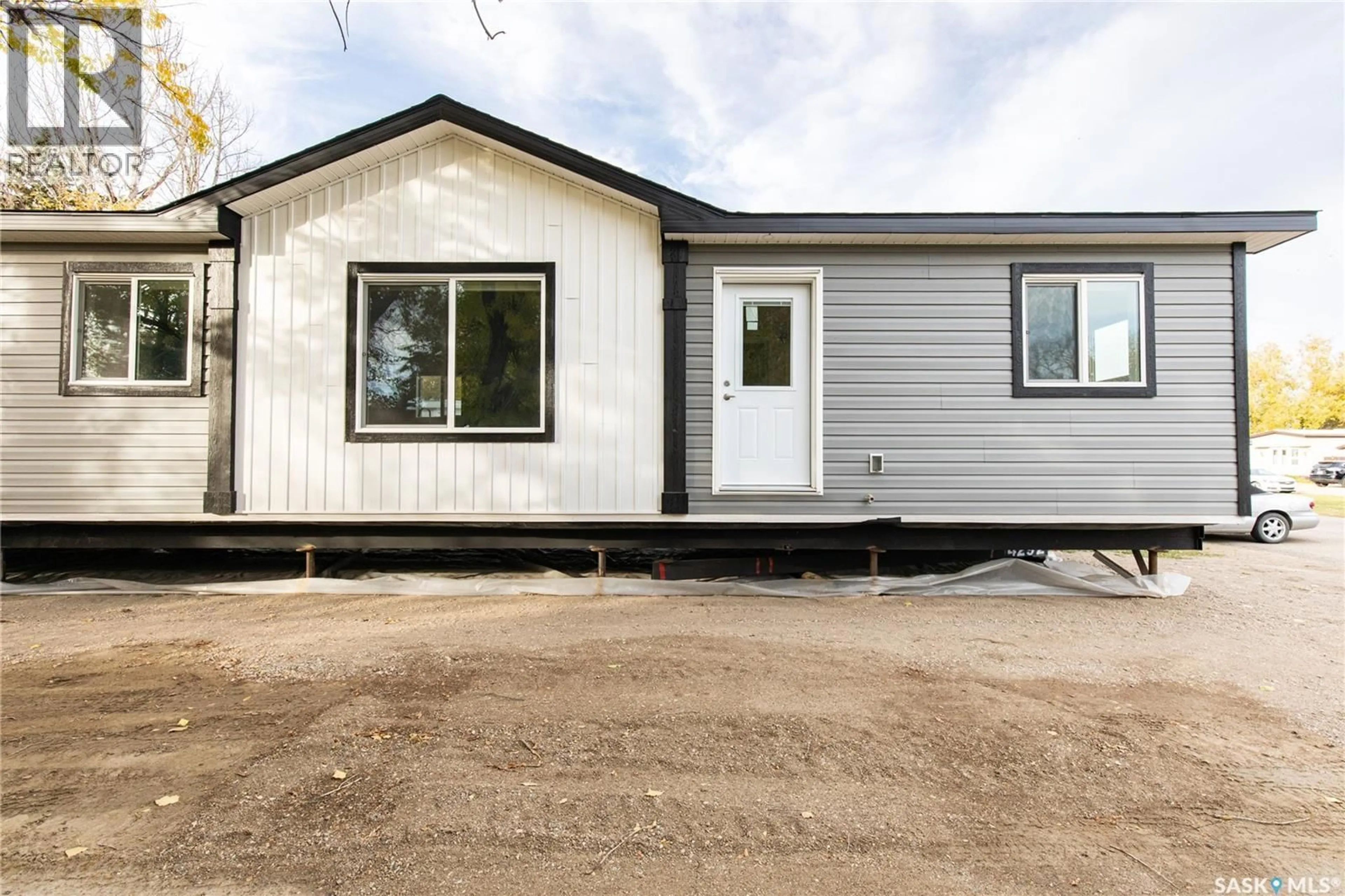 Home with vinyl exterior material, street for D6 - 1455 9TH AVENUE, Moose Jaw Saskatchewan S6J1C6