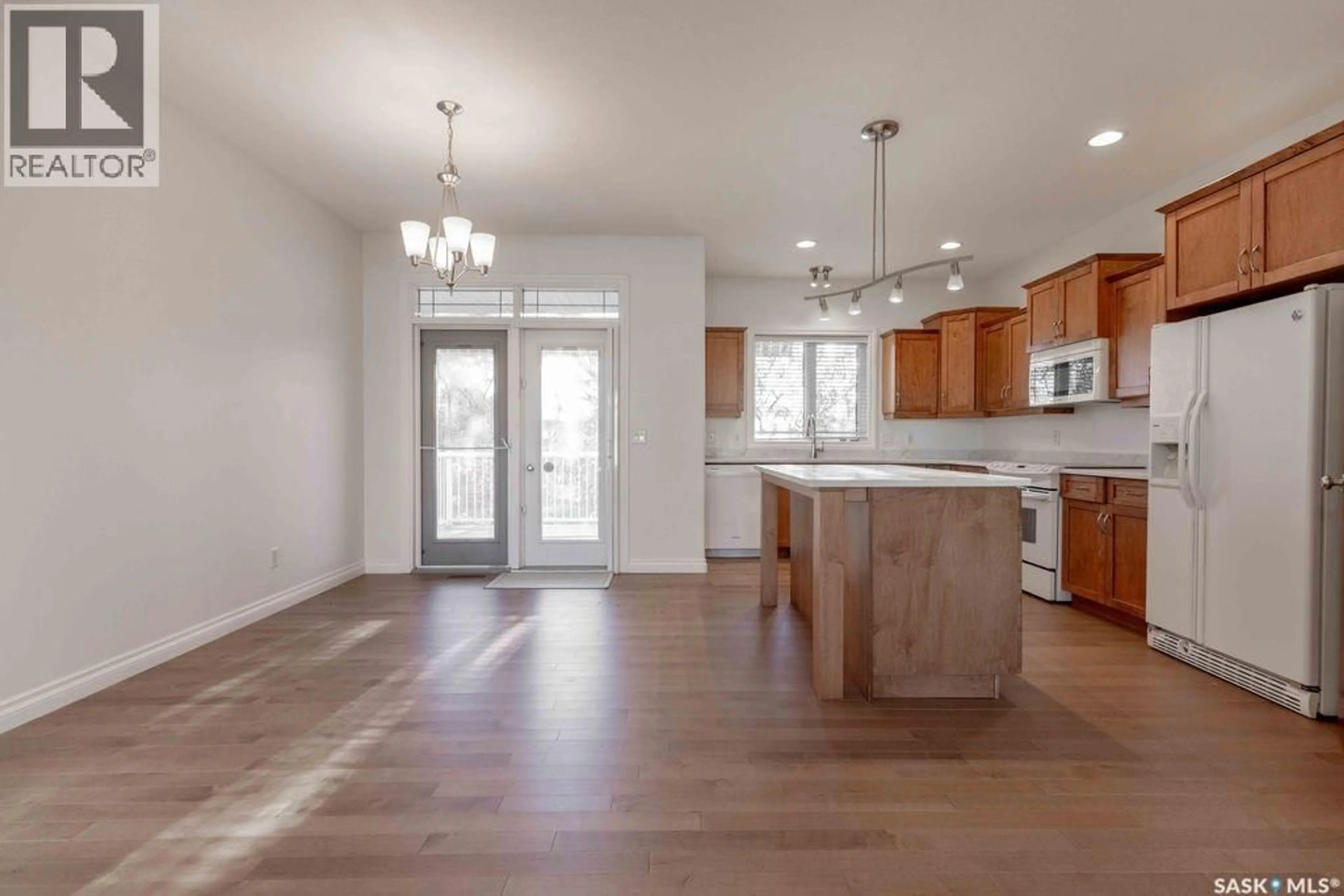 Open concept kitchen, unknown for 210 GREAVES COURT, Saskatoon Saskatchewan S7W1A8