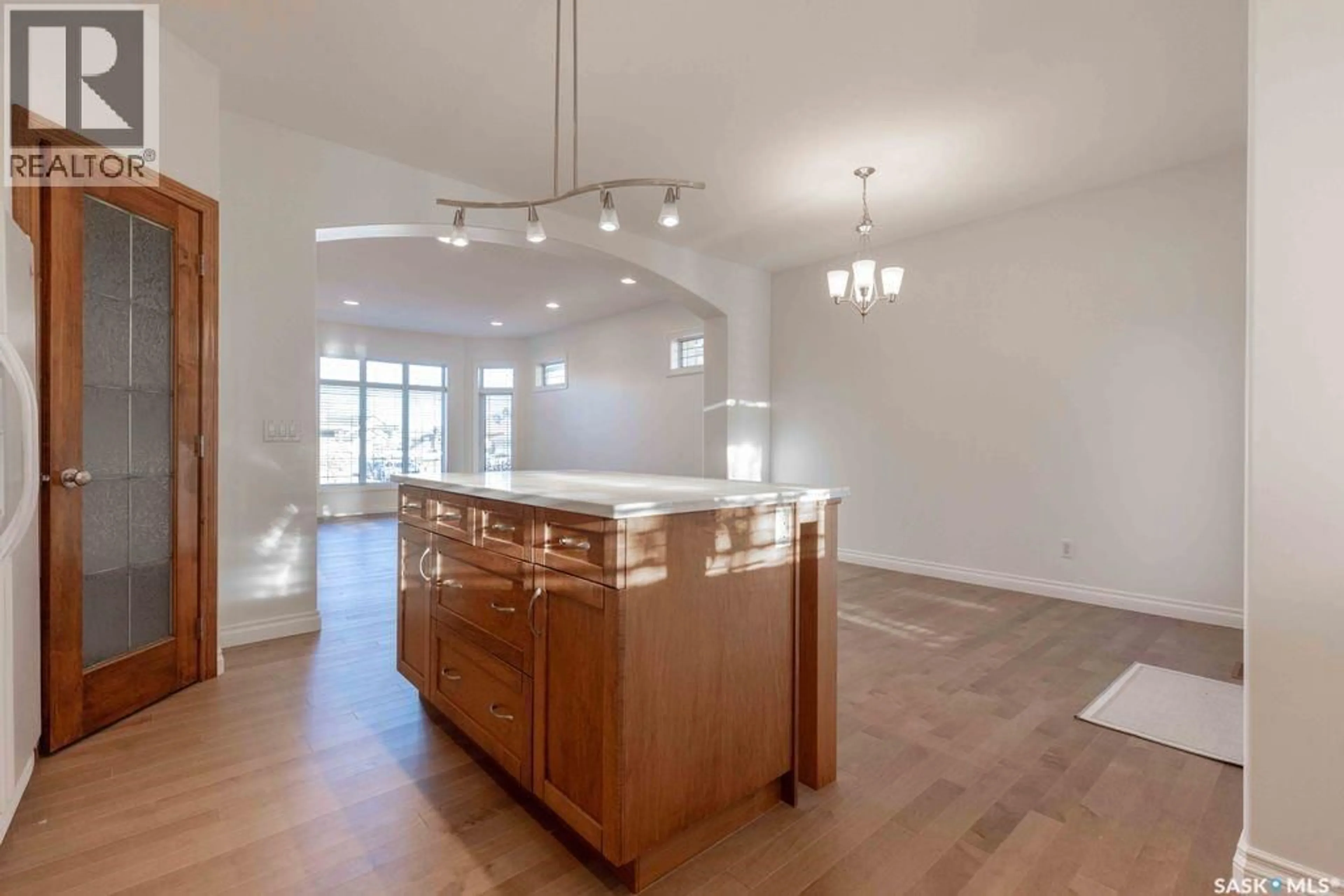 Open concept kitchen, unknown for 210 GREAVES COURT, Saskatoon Saskatchewan S7W1A8